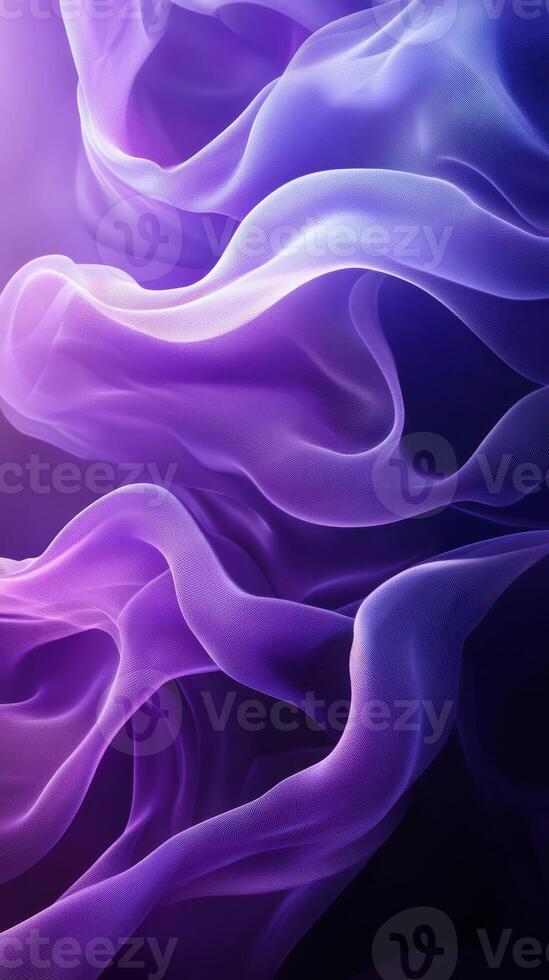 Colorful flowing fabric creates an abstract design with purple and lavender hues photo