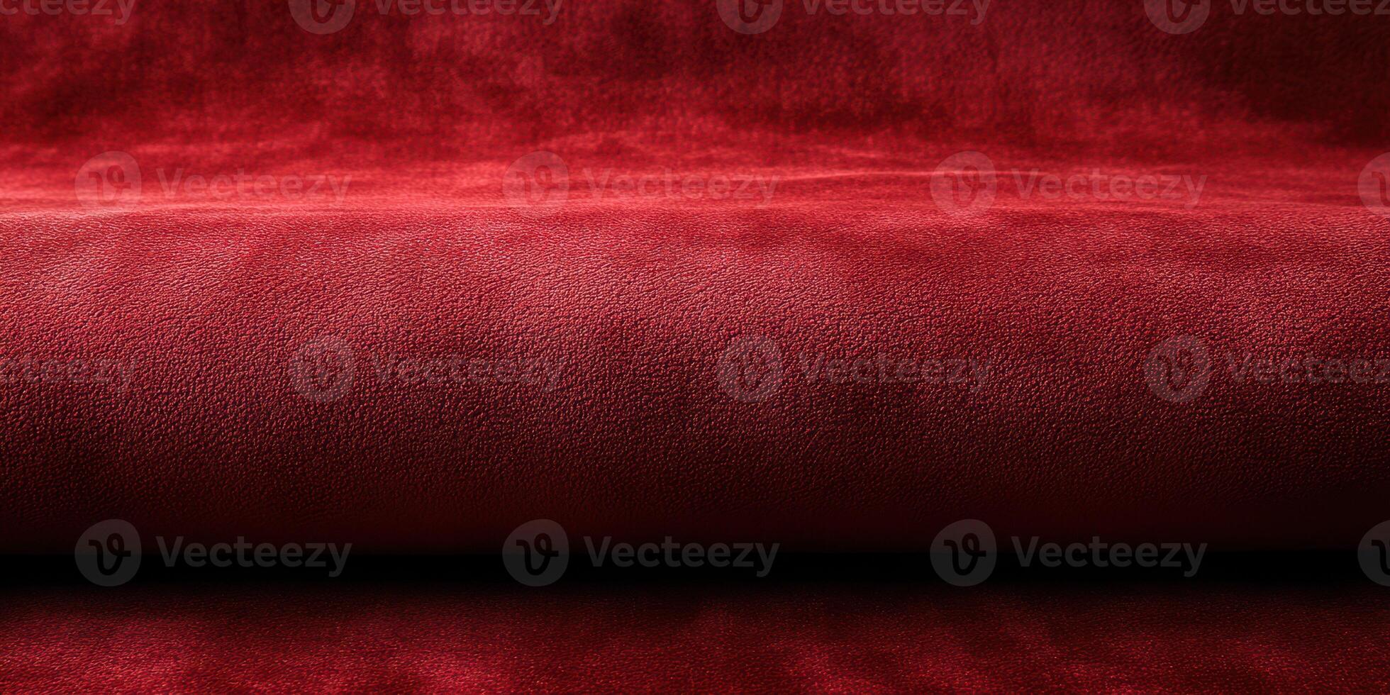 Luxurious deep red suede fabric showcasing a rich texture under soft natural light in a minimalist setting photo