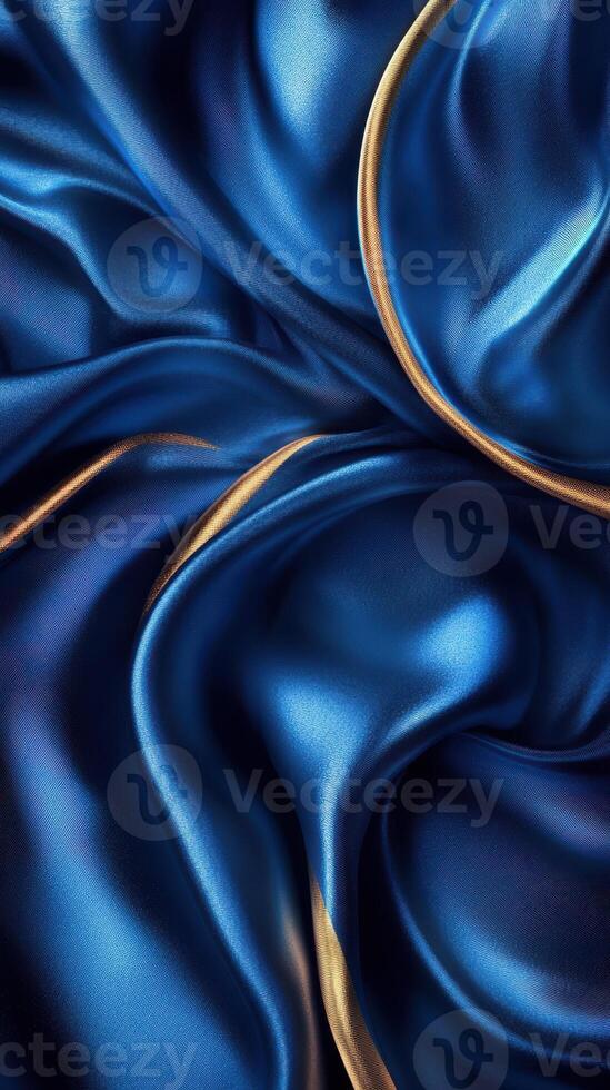 Richly textured blue satin fabric with delicate gold trim creates an elegant visual contrast ideal for design inspiration photo