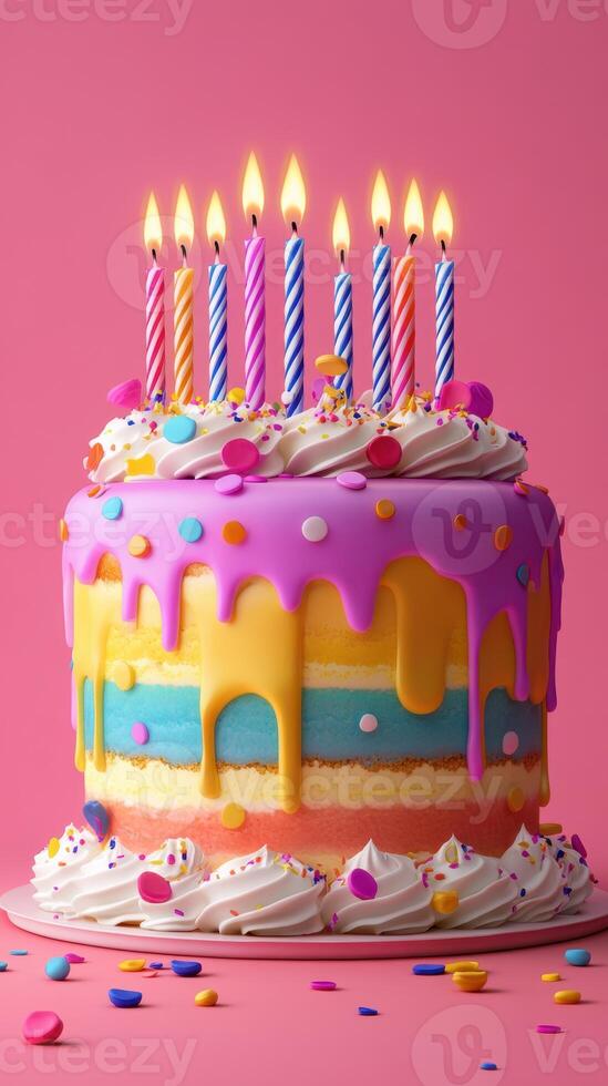 Celebrate with a colorful birthday cake topped with candles and sprinkles on a vibrant pink background photo
