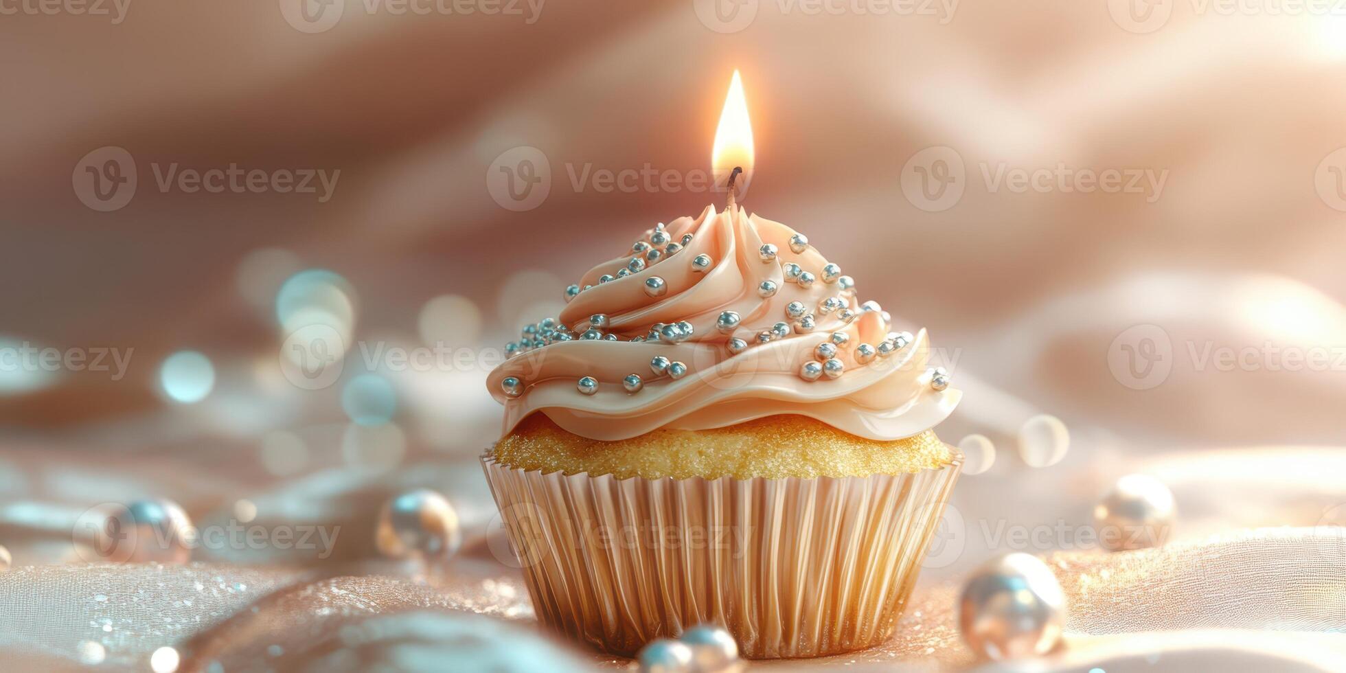 Delicious cupcake with pink frosting and a candle on a shiny surface photo