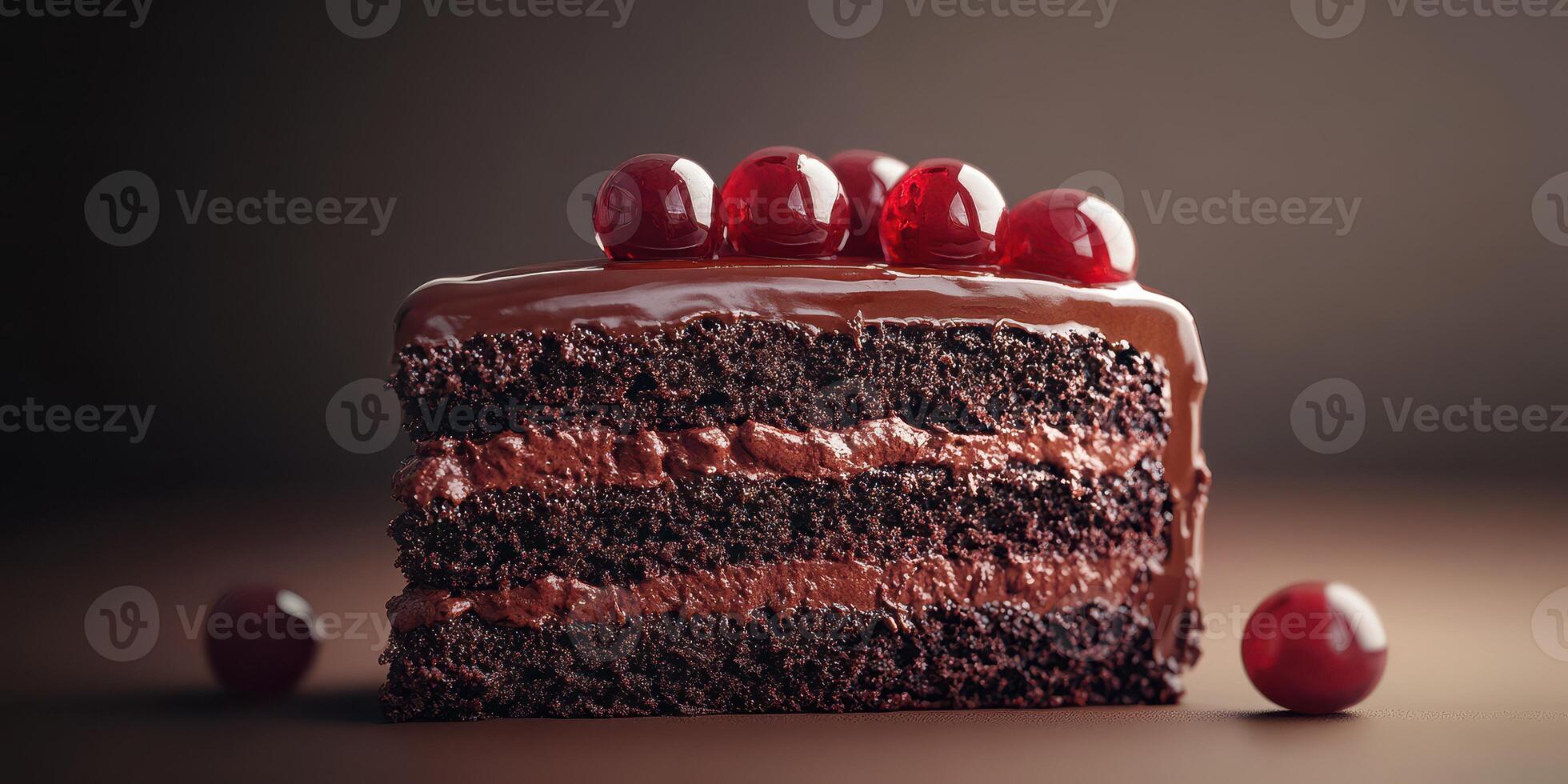 Moist chocolate cake with cherry toppings served on a wooden surface in a dimly lit setting photo