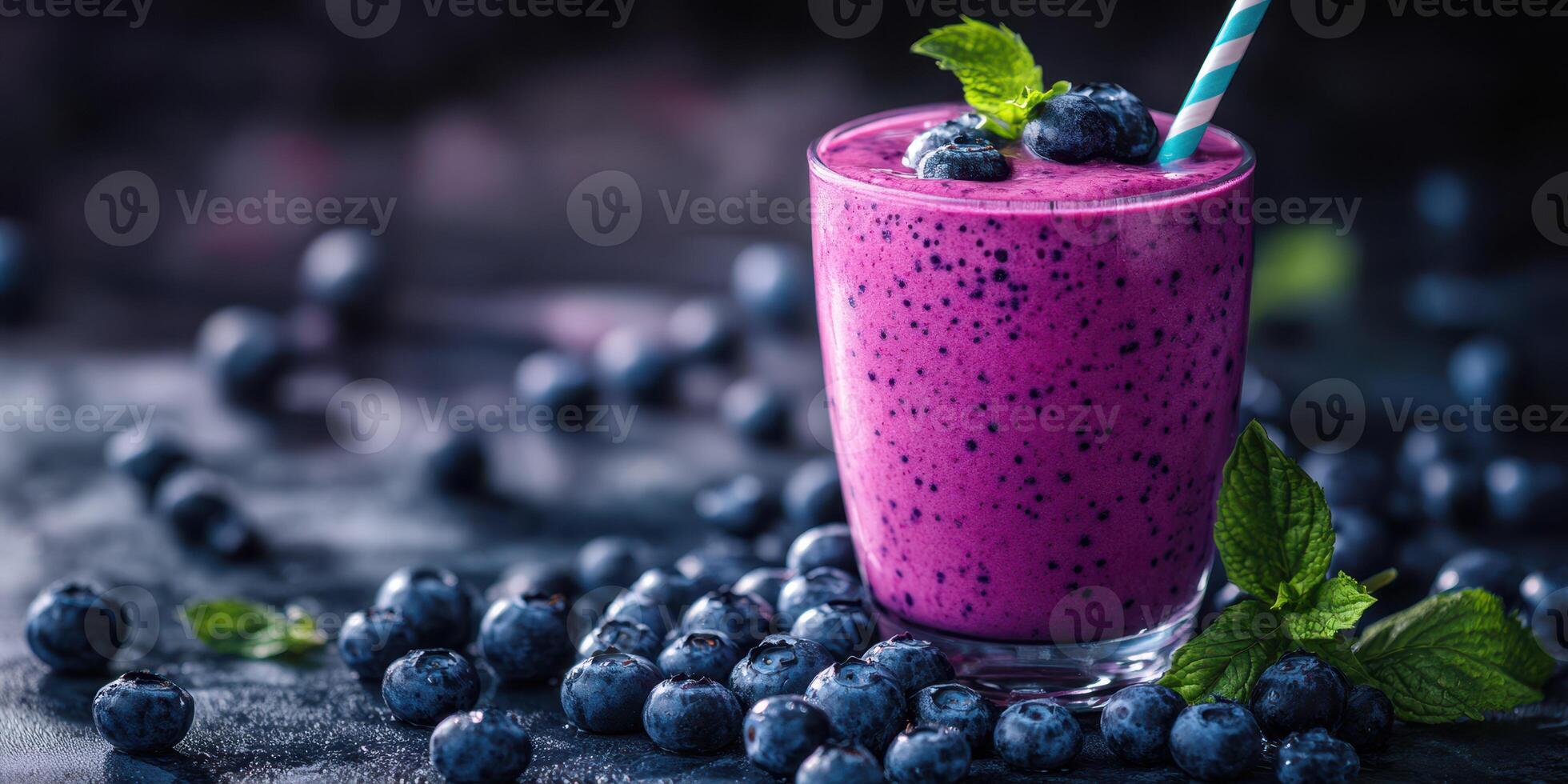 Refreshing blueberry smoothie with mint and berries arranged artistically on a dark background photo