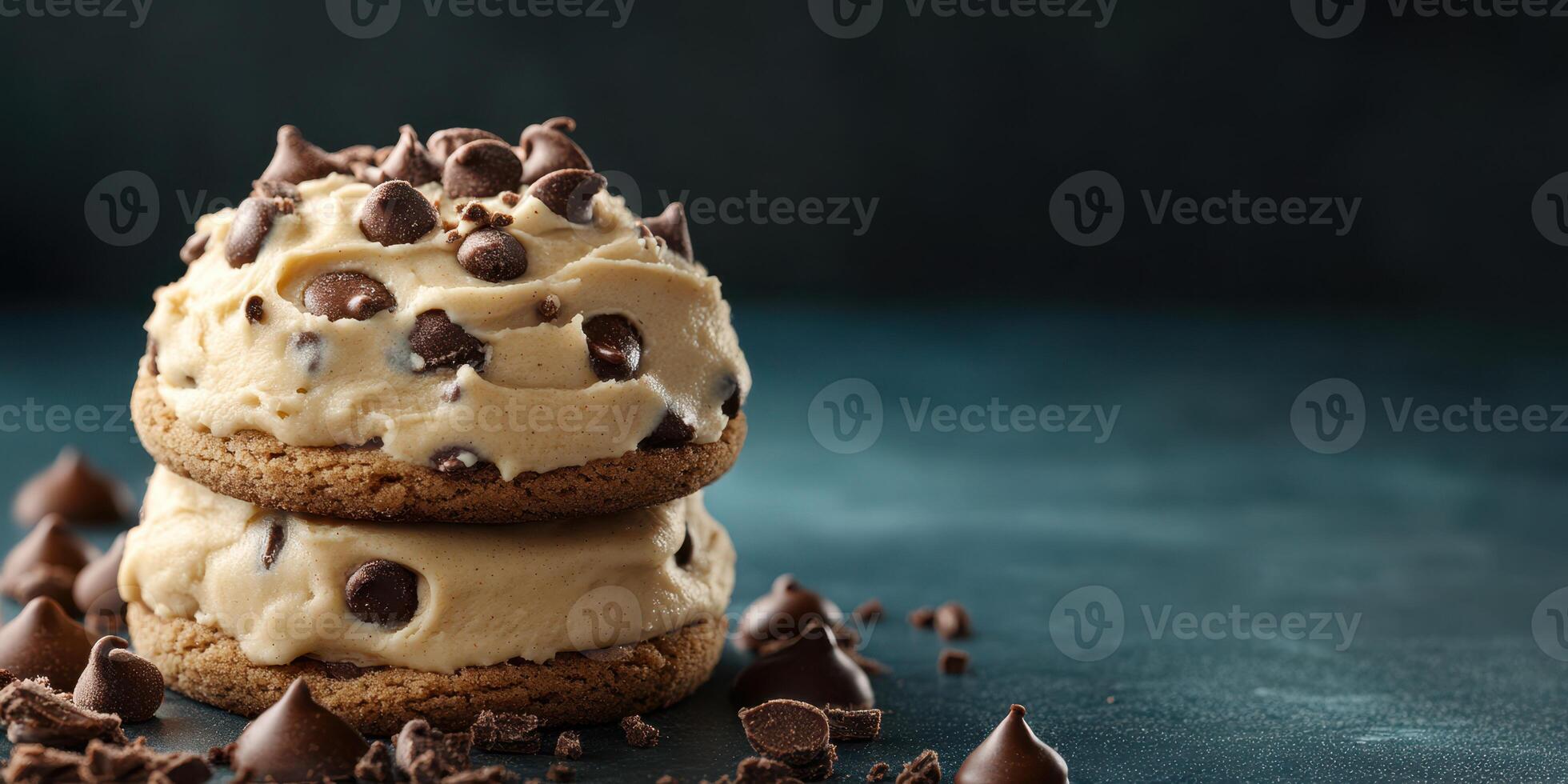 Delicious stacked cookies filled with creamy chocolate chip frosting on an elegant surface photo