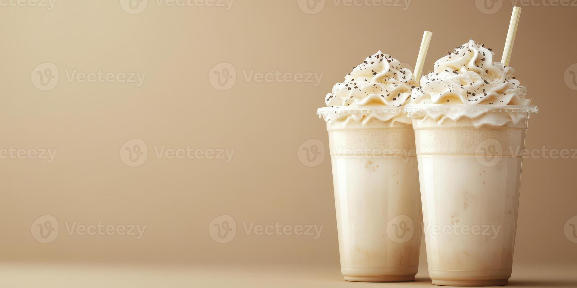 Delicious milkshakes topped with whipped cream and chocolate sprinkles on a neutral background photo