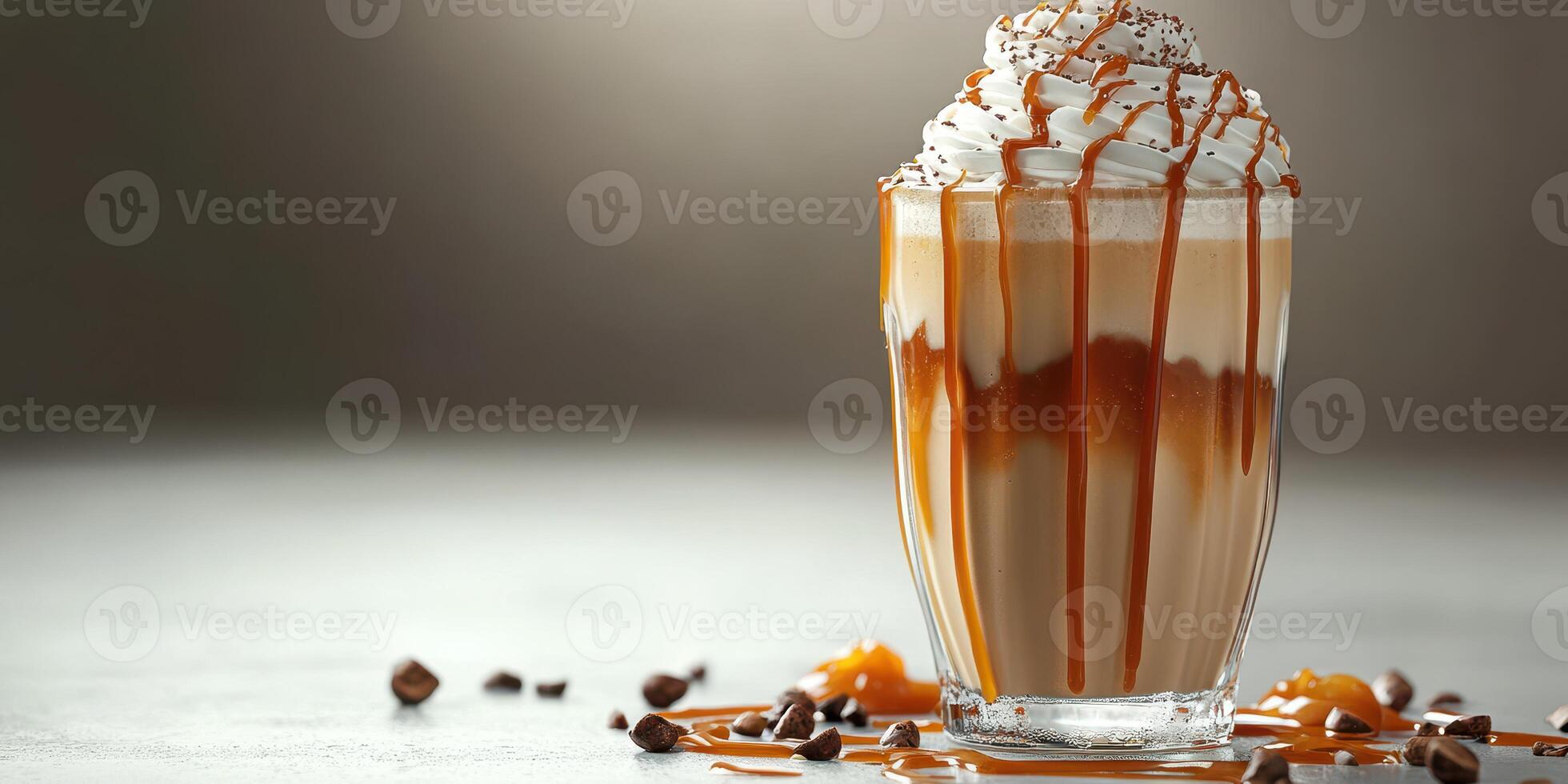 Delicious caramel latte topped with whipped cream and drizzled with caramel syrup in a cozy cafe setting photo