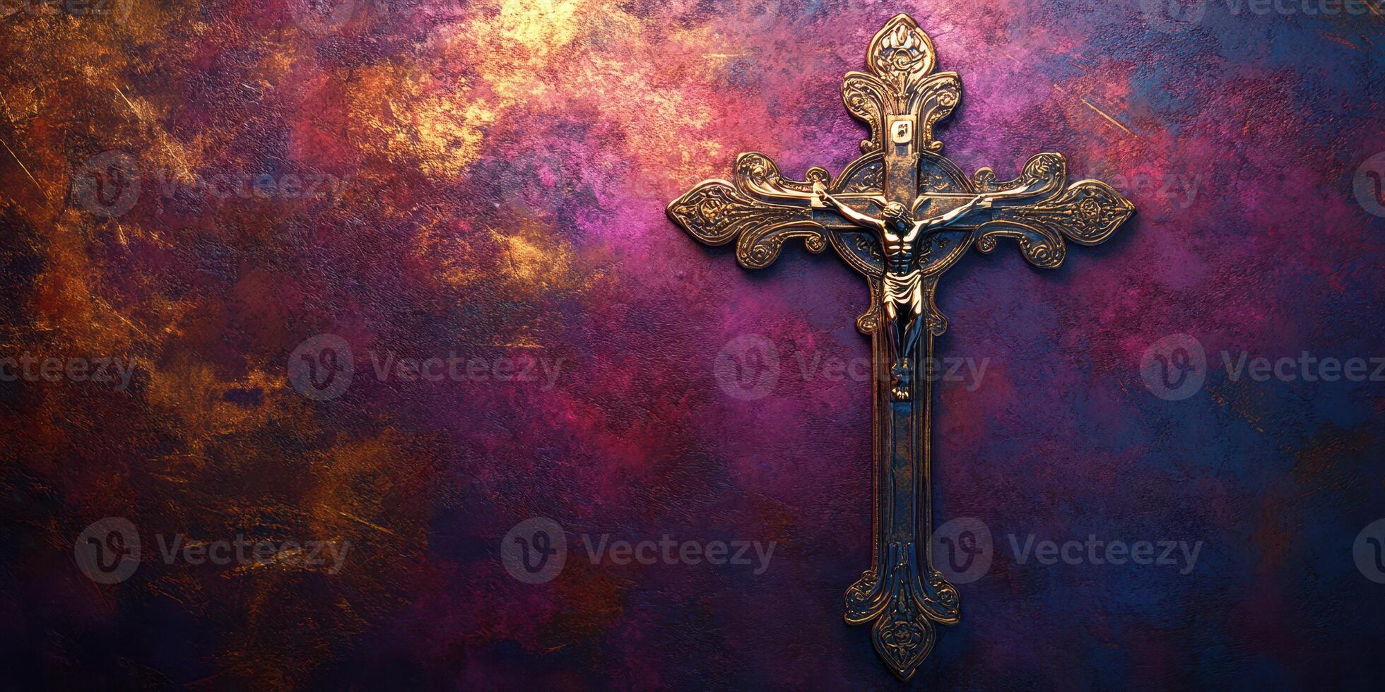 Intricate golden crucifix against a textured, colorful background emphasizing religious significance photo