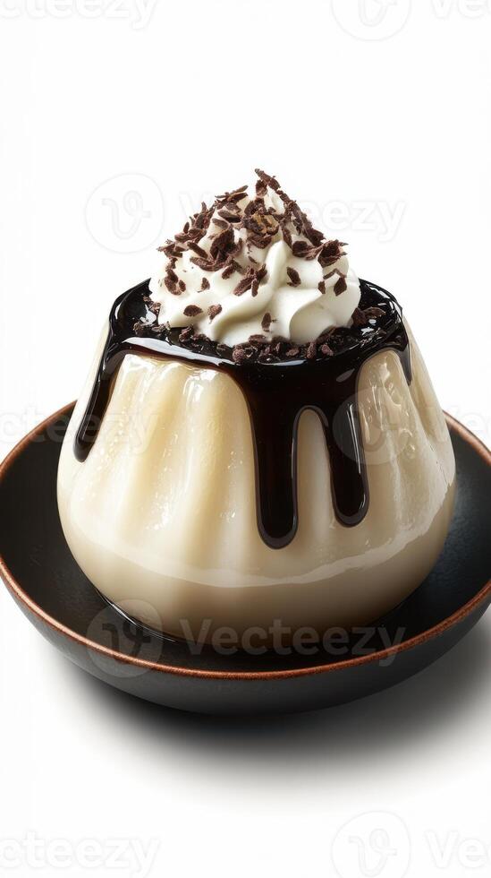 Creamy dessert topped with chocolate sauce and whipped cream served on a black plate photo