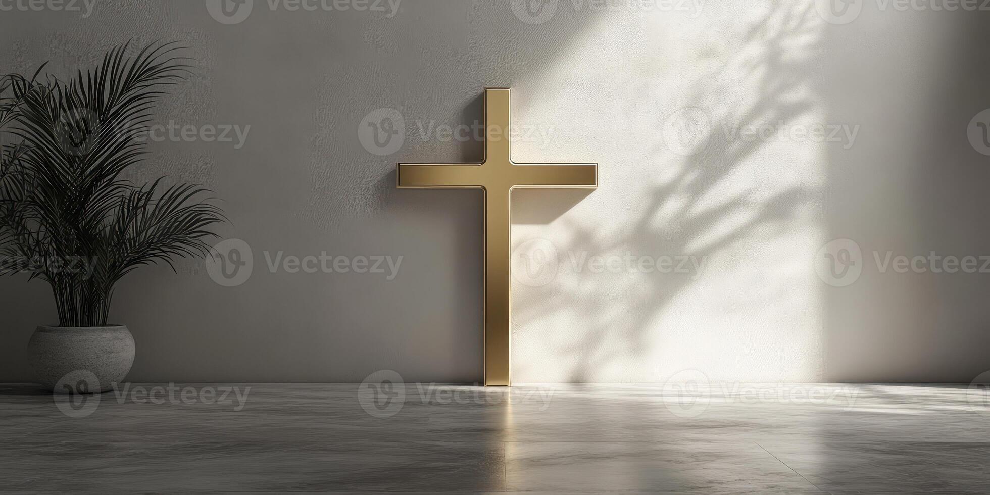Modern gold cross displayed against a minimalist wall with shadow play from a nearby plant in a serene indoor setting photo