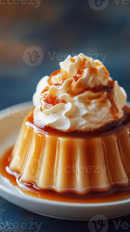 Delicious caramel flan topped with whipped cream on a plate photo
