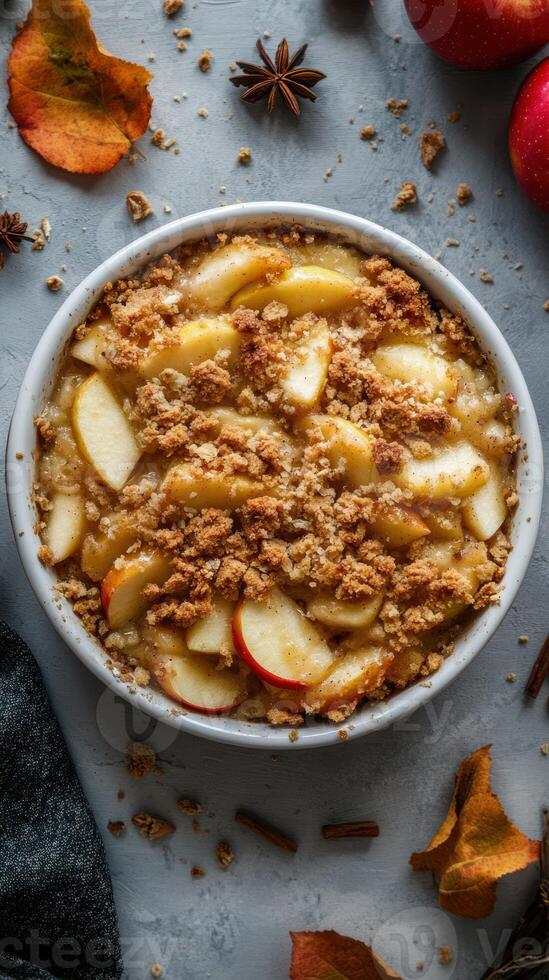 Delicious apple crisp dessert with fresh apples and crumb topping ready for autumn gatherings photo