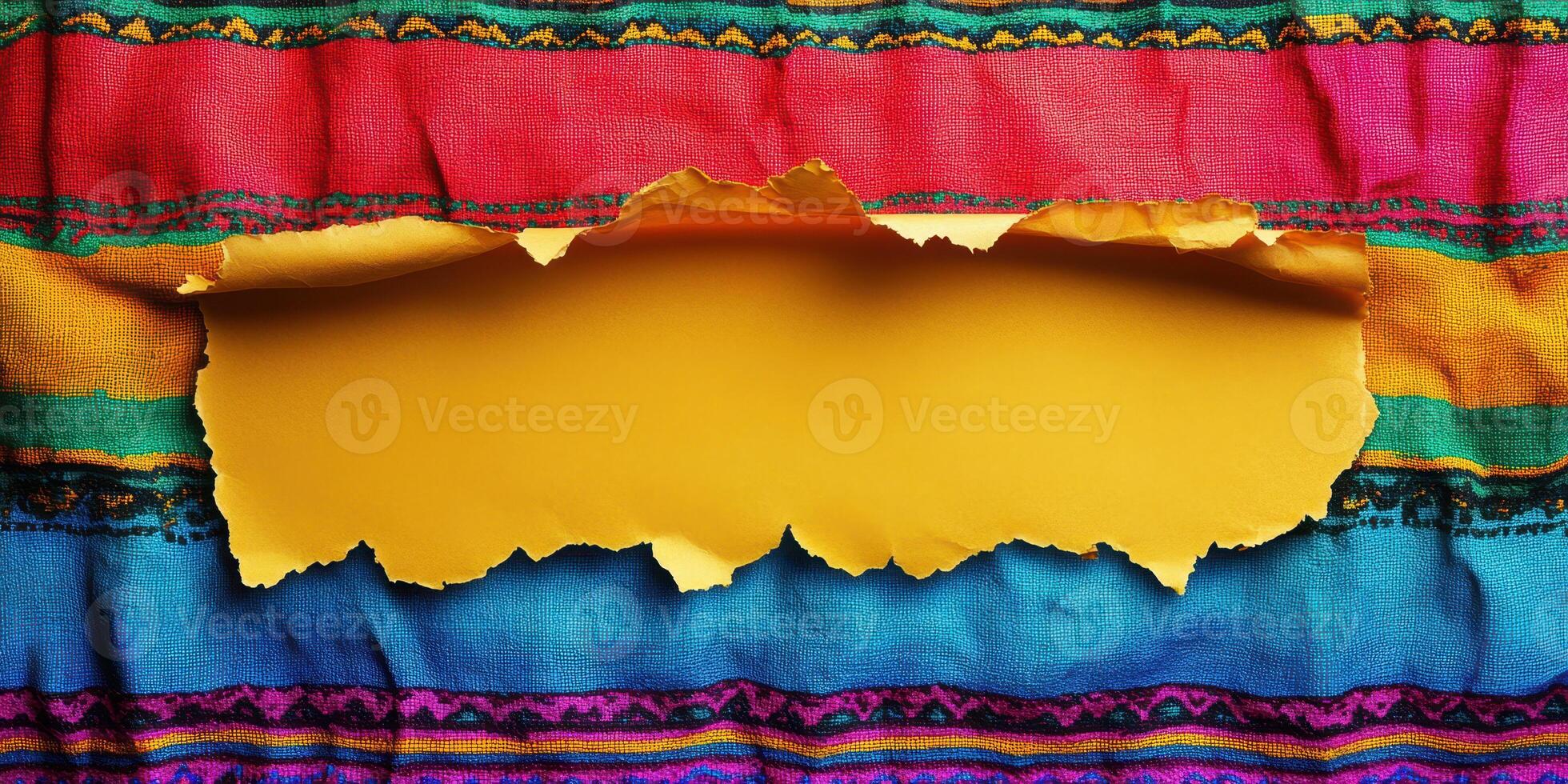 Vibrant colored fabric background with ripped yellow paper strip for creative designs and presentations photo