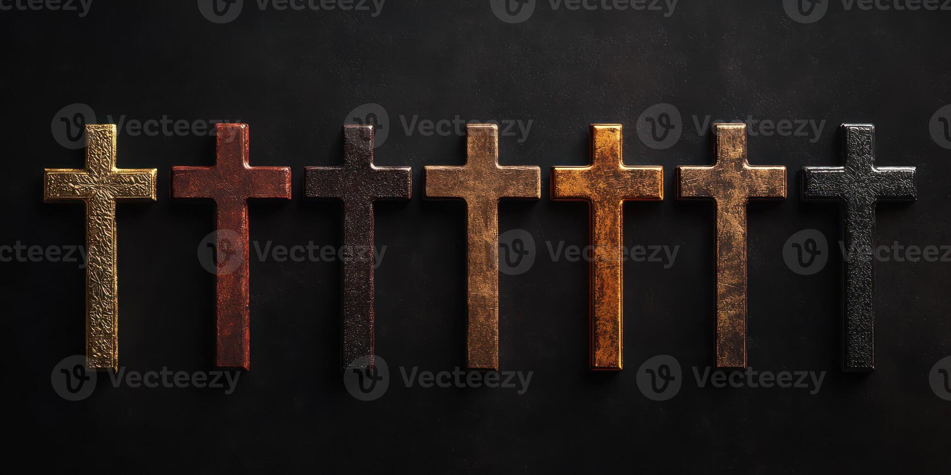 Different styles of crosses displayed in a row against a dark background for artistic appreciation photo