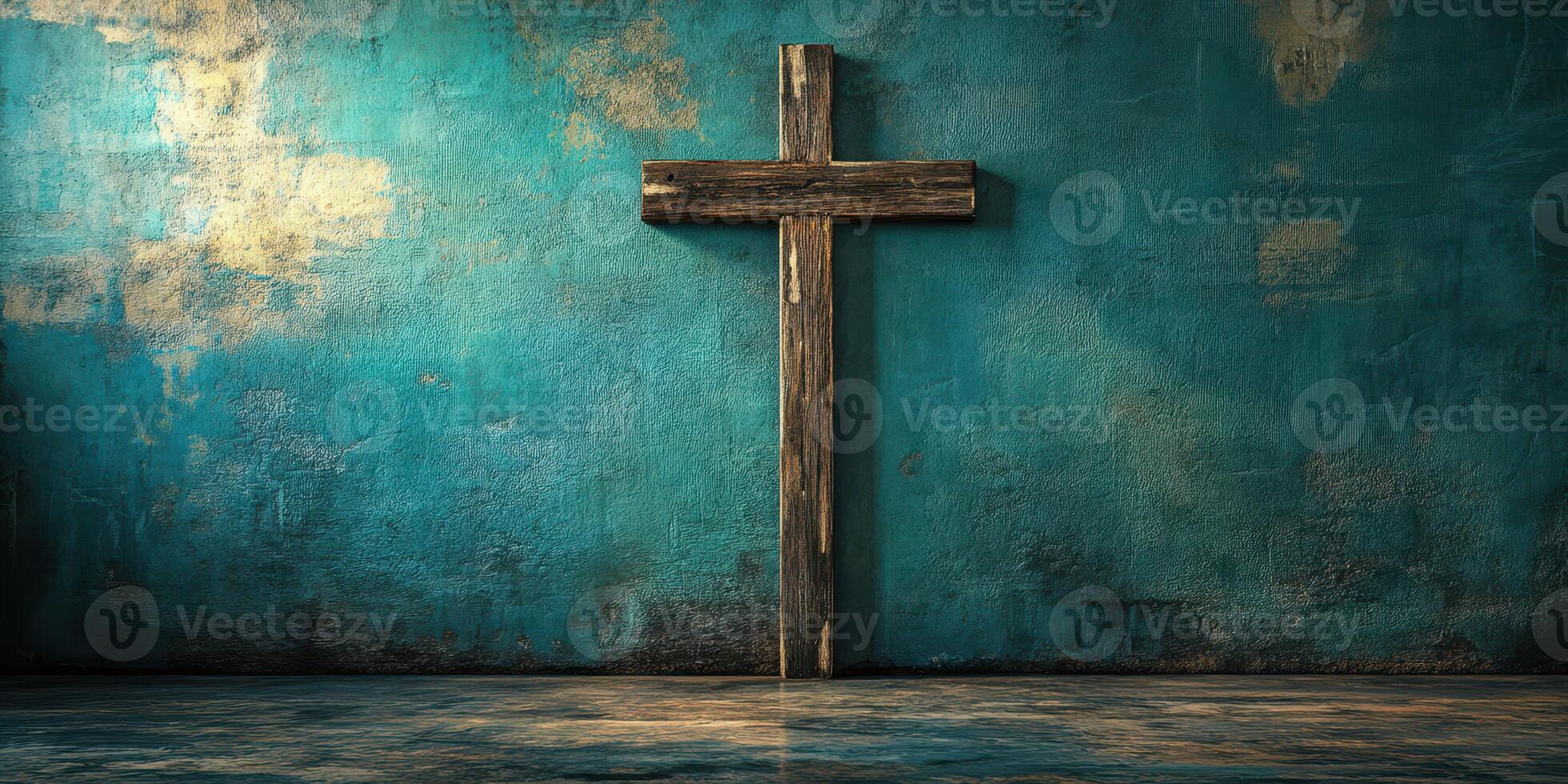 Rustic wooden cross on a textured blue wall in a dimly lit space photo