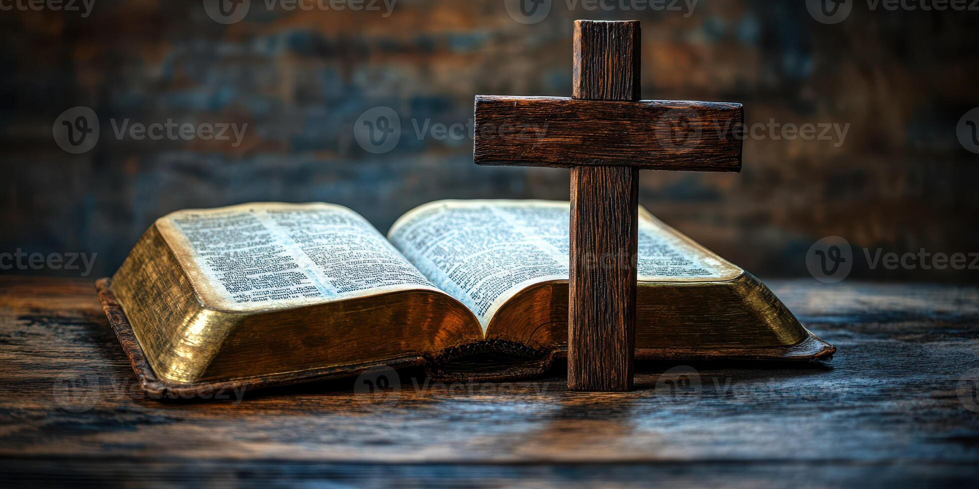 Bible and wooden cross displayed on a rustic table in a dimly lit room photo
