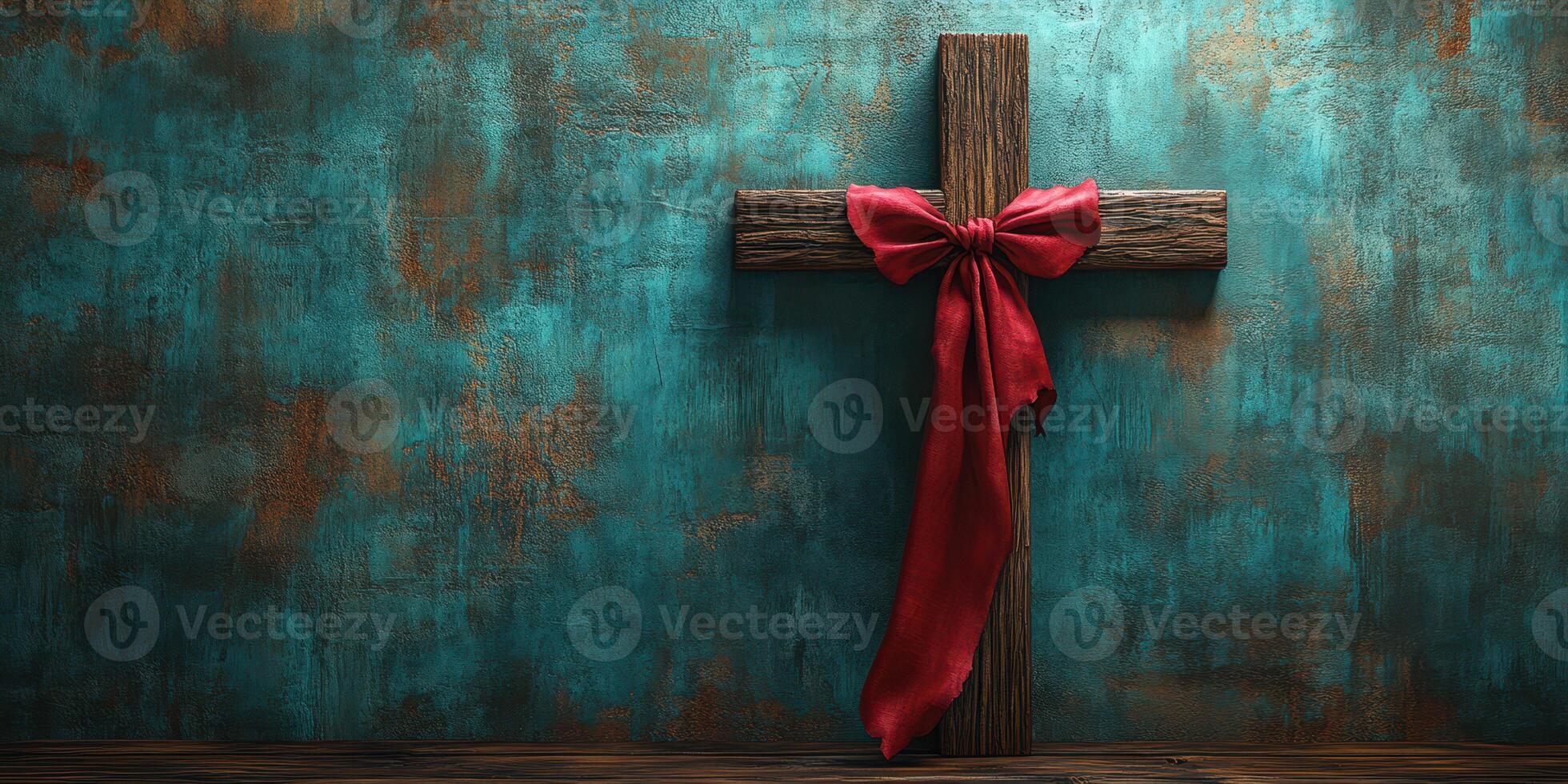 Rustic wooden cross with red bow against textured turquoise wall creates a serene and reflective atmosphere photo