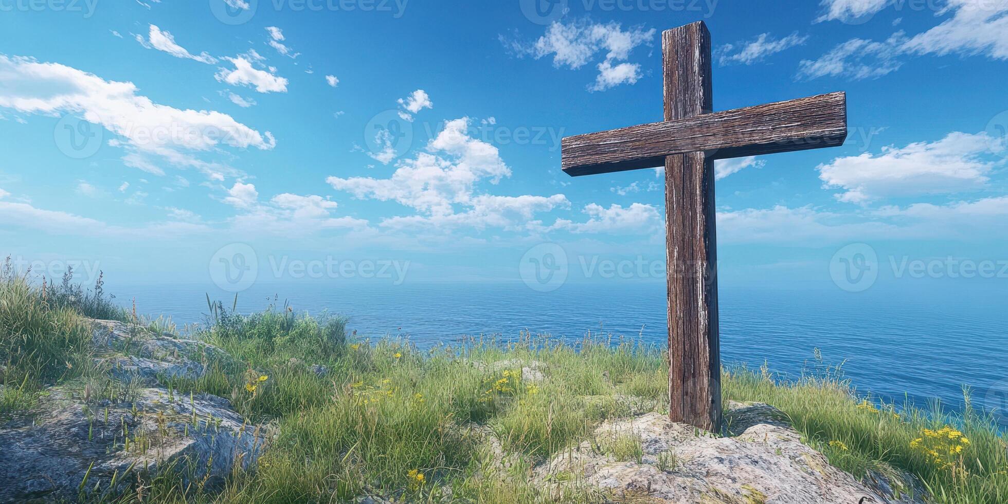 Cross on cliff overlooking serene ocean under bright blue sky with scattered clouds in late afternoon photo