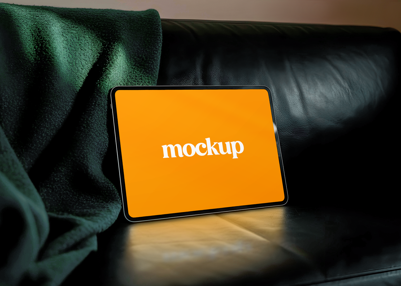 Tablet on Leather Couch Mockup psd