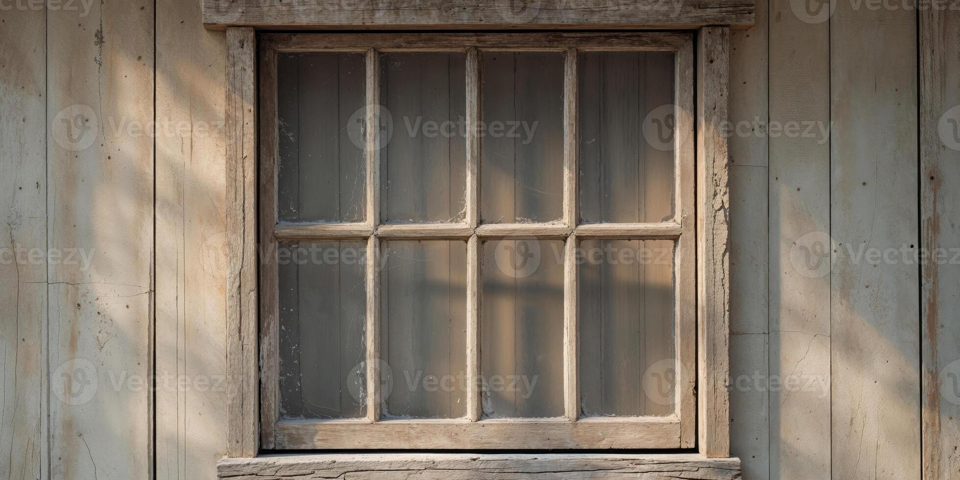 Wooden window with panes set into a wooden wall. photo