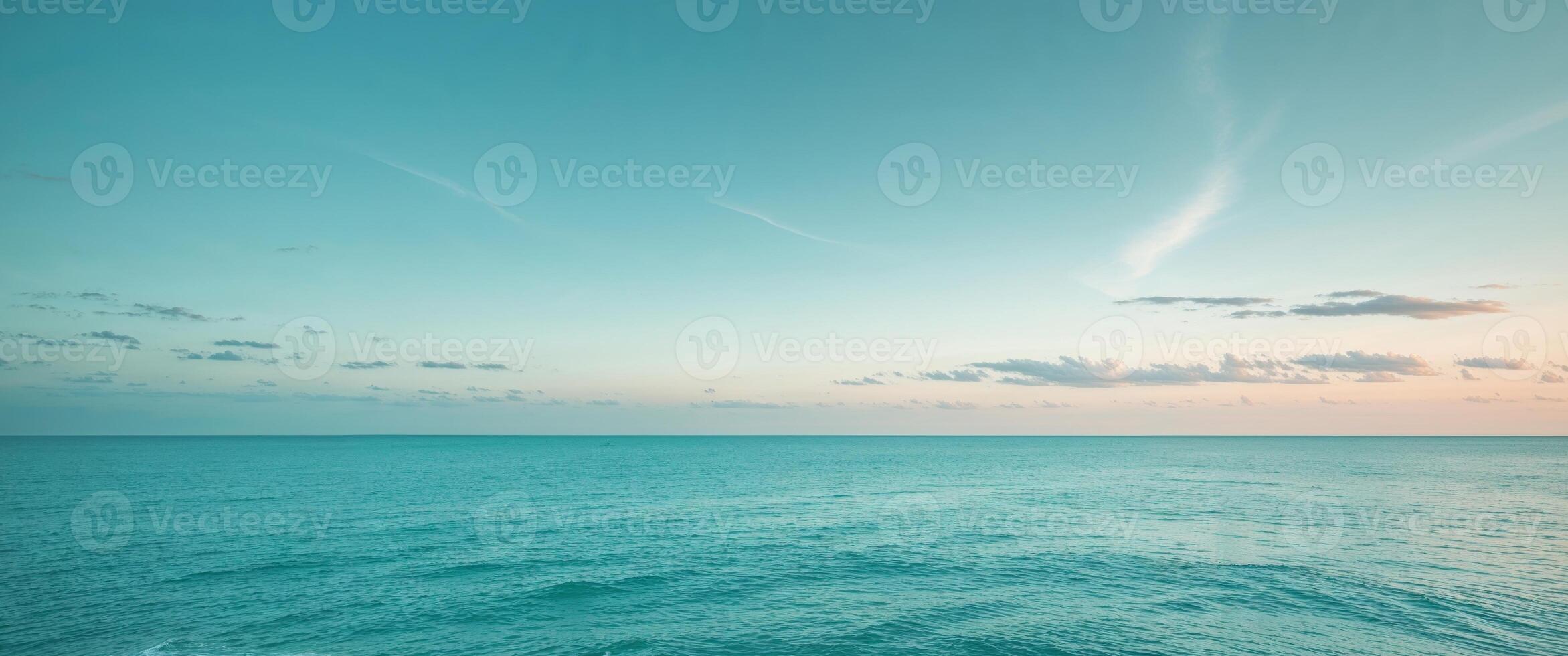Serene Ocean Horizon Calm Teal Sea and Soft Blue Sky. photo