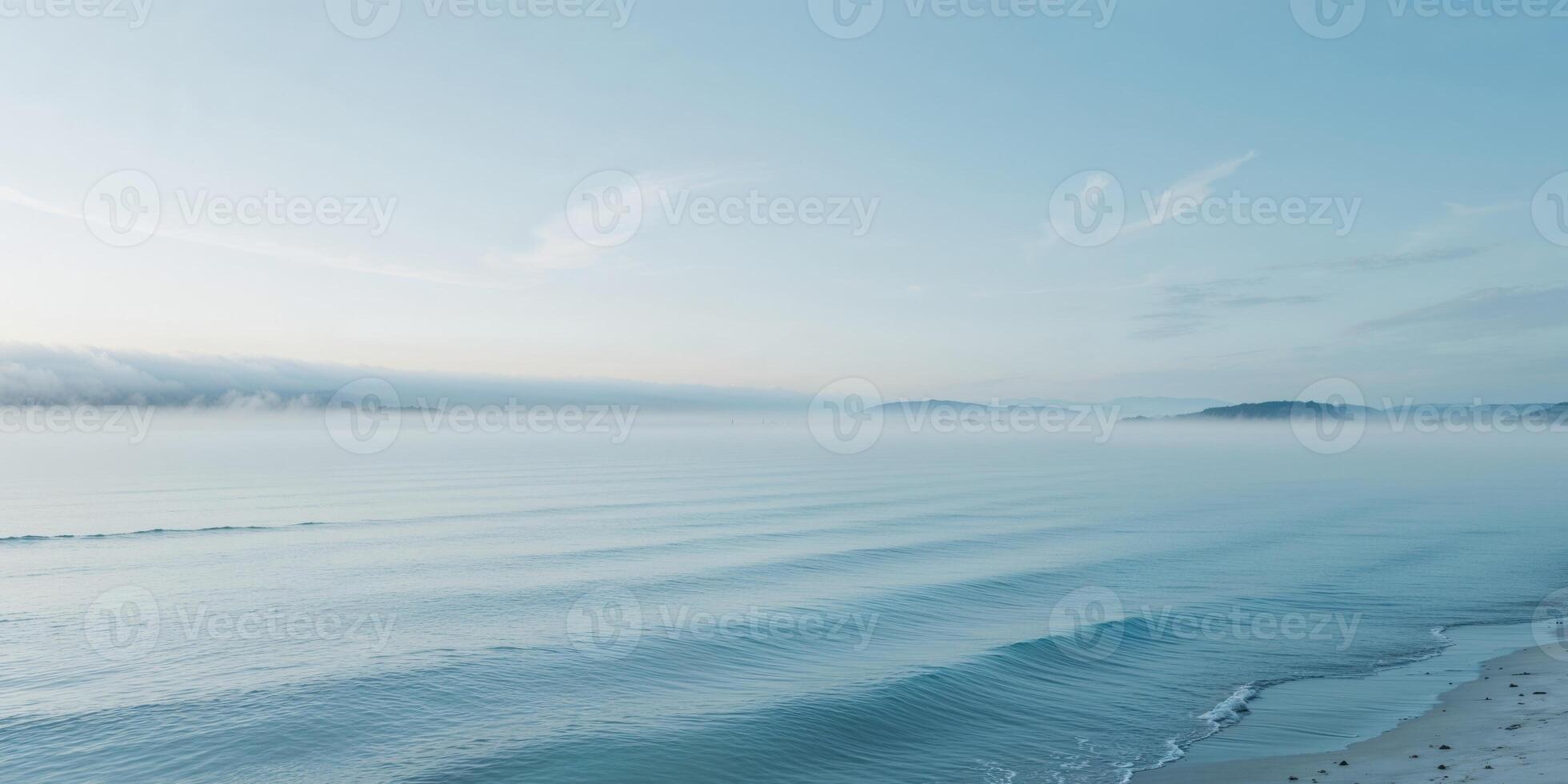 Serene Ocean Background with Calm Blue Waters and Soft Fog in the Distance. photo