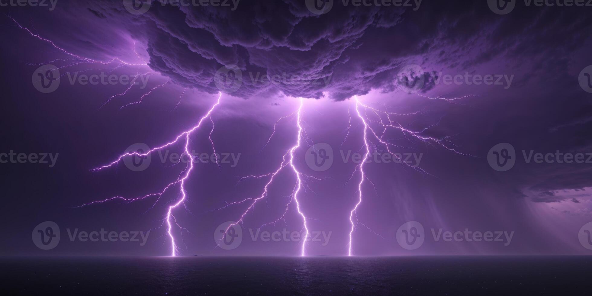 Lightning strikes over the ocean in a stormy sky photo