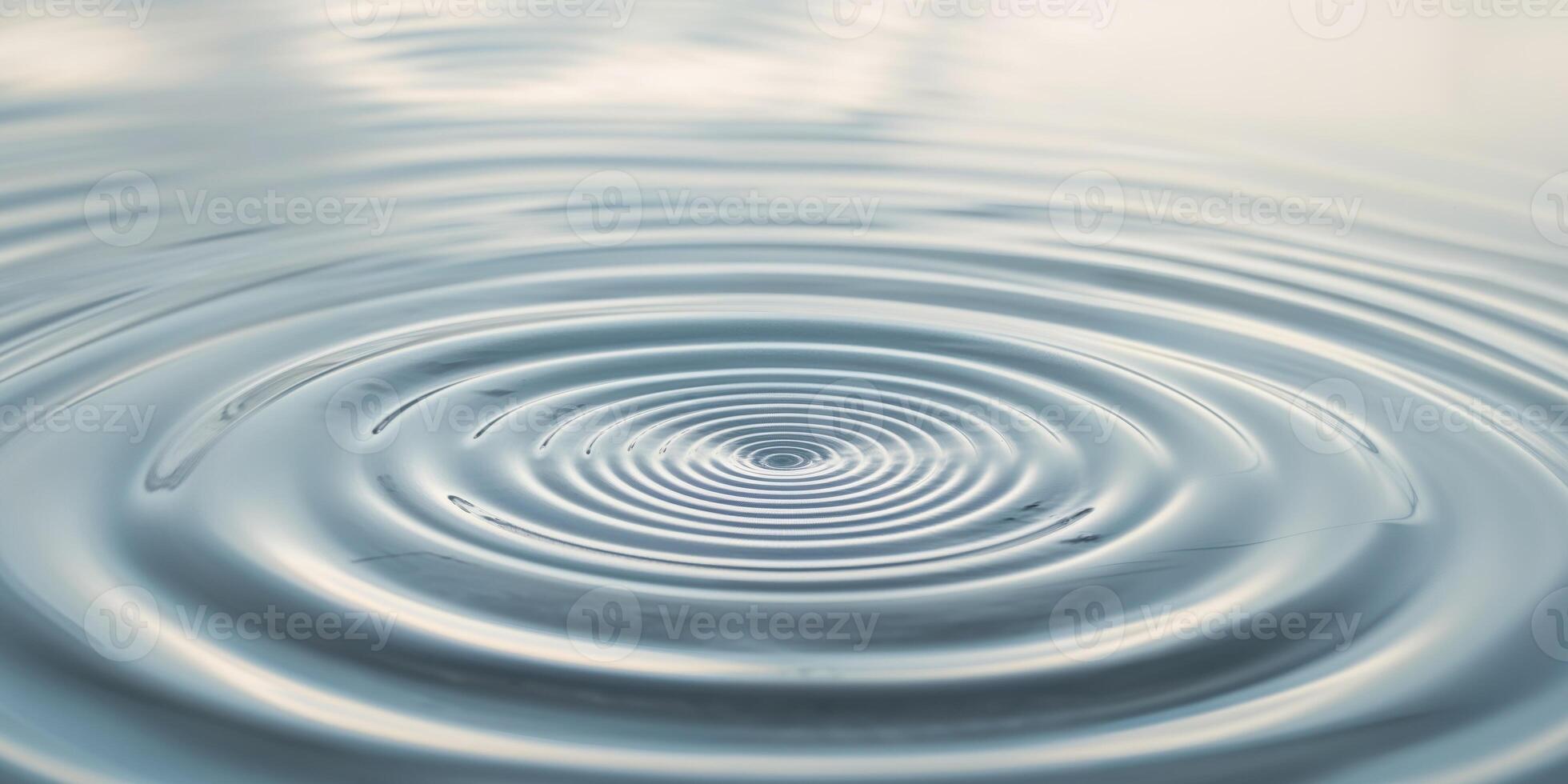 Circular ripples emanate from a point on water surface photo