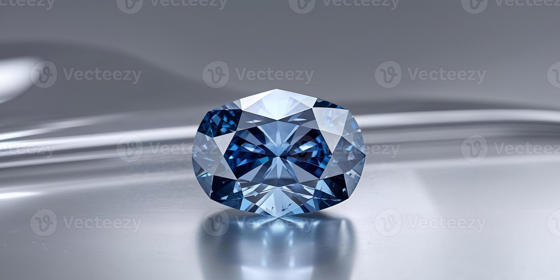 A blue diamond sitting on a silver surface photo