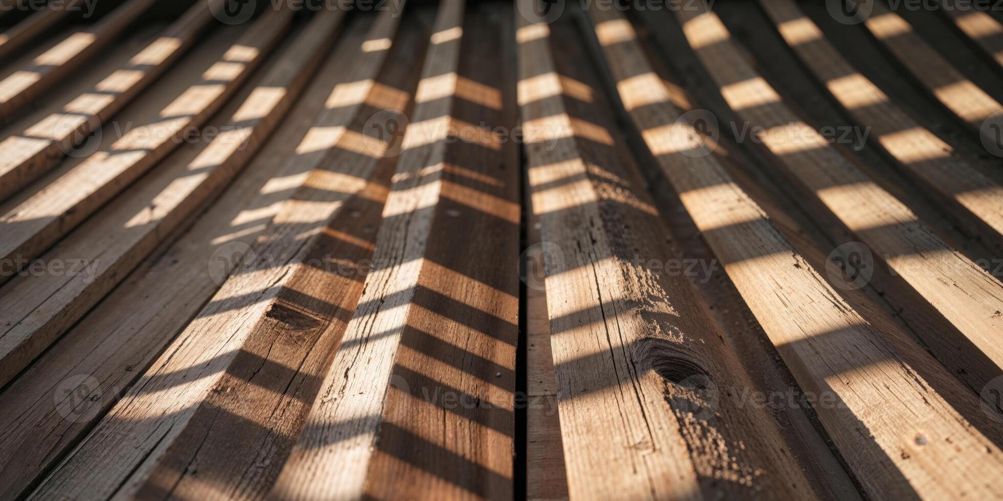 A close up of a wooden floor with sunlight photo