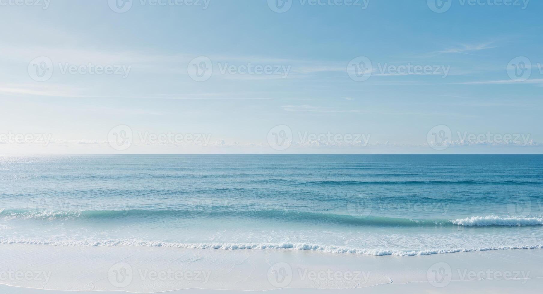 A beach with waves and blue sky photo