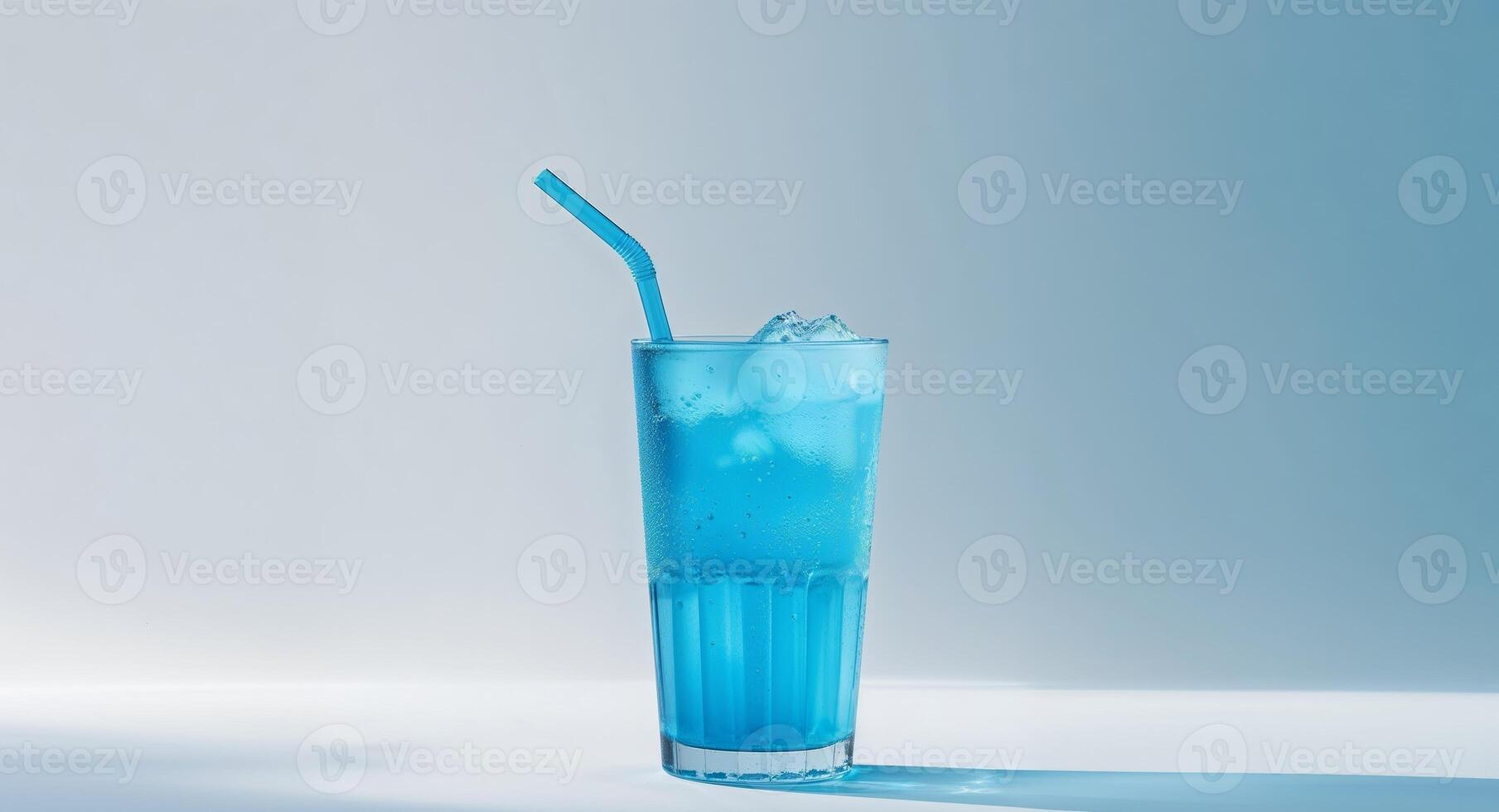 Cool and refreshing blue drink with straw summer delight refreshing. photo