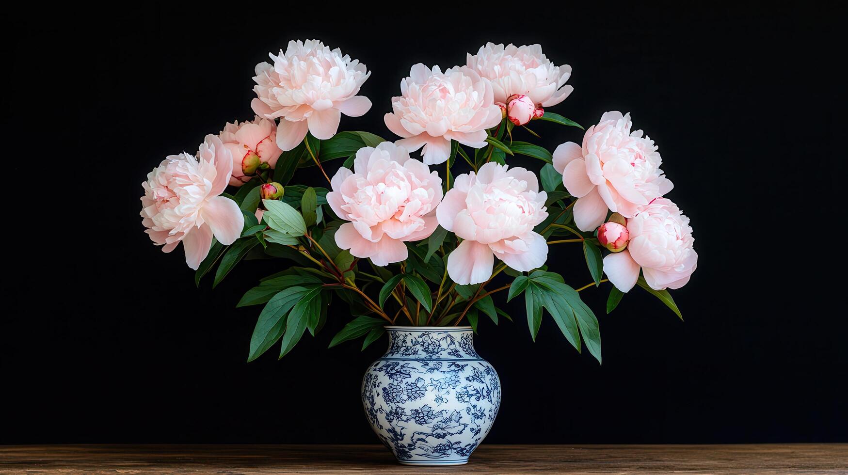 Elegant Pink Peonies in Vintage Blue and White Porcelain Vase Dark Background photo
