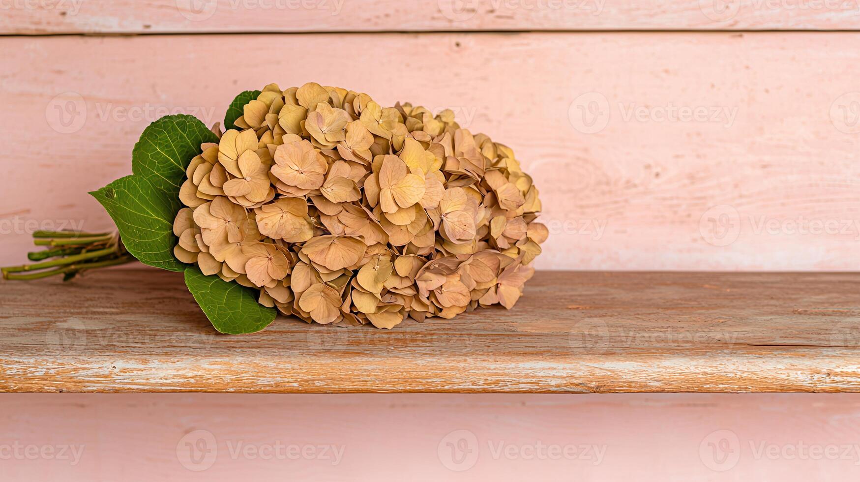 Dried Hydrangea Bouquet on Rustic Wooden Shelf Pastel Pink Background photo