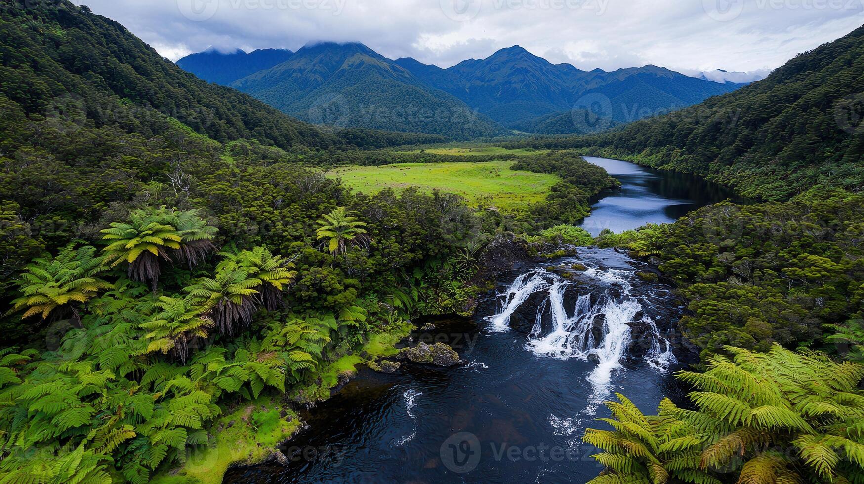 Serene Waterfall Cascading in Lush Green Valley Mountain River Scene photo