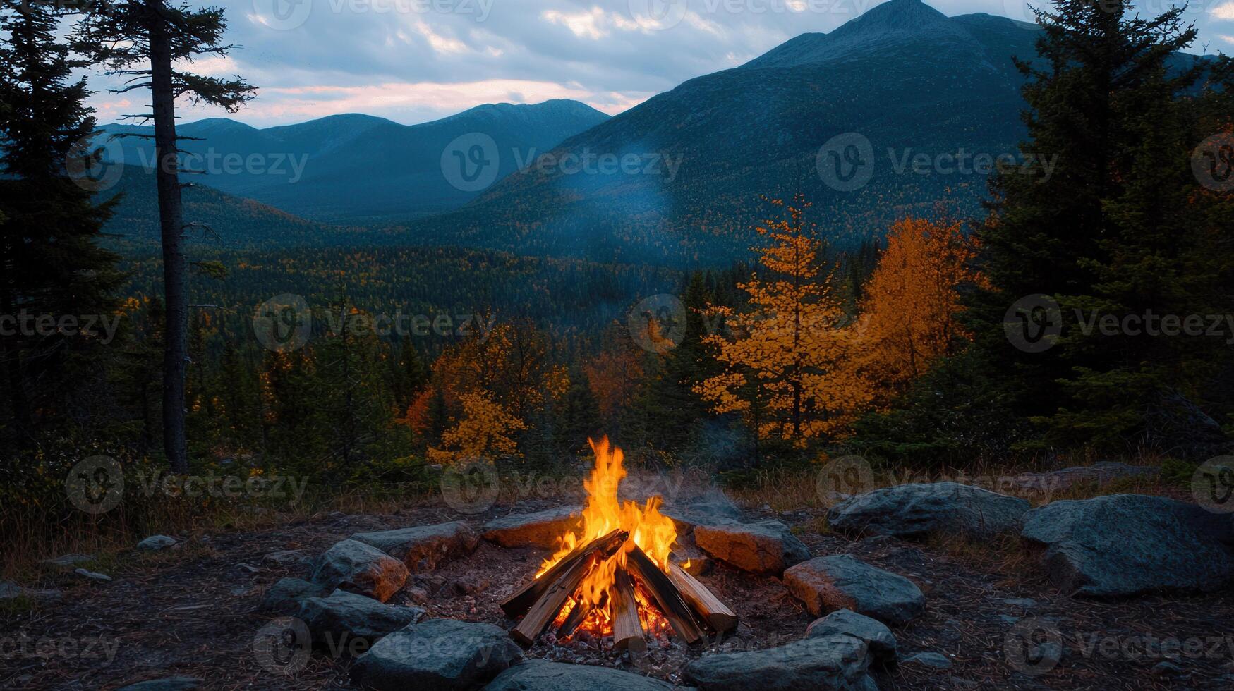 Majestic Mountain Campfire at Dusk Autumnal Forest Fire Pit Scene photo