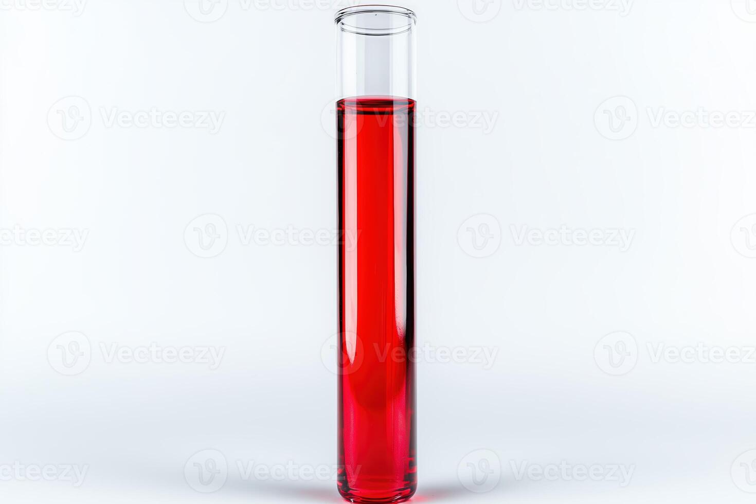 Test tube with red liquid on a light background photo