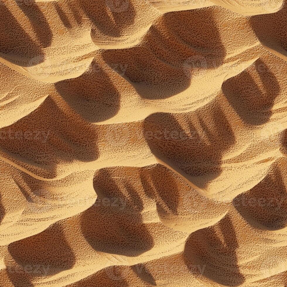 Abstract patterns in golden sand dunes with shadows and textures photo