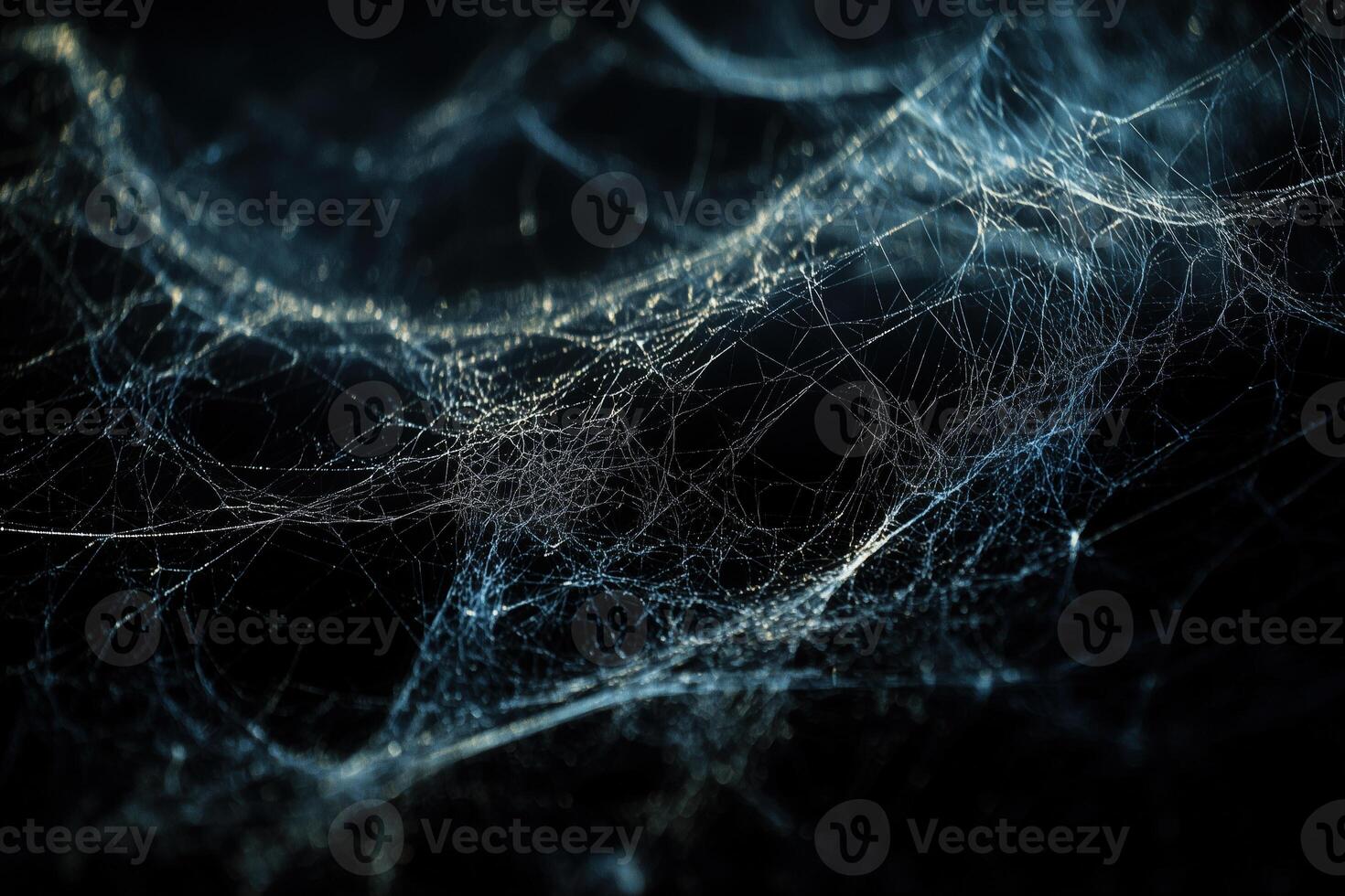 Close-up abstract texture of fine cobwebs on a dark background photo
