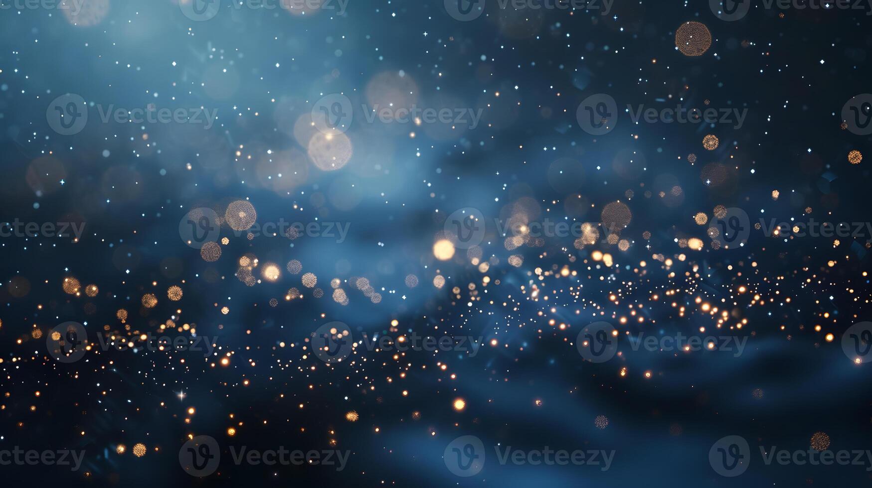 Blurry image of electric blue drizzle over city with gold glitter on water photo