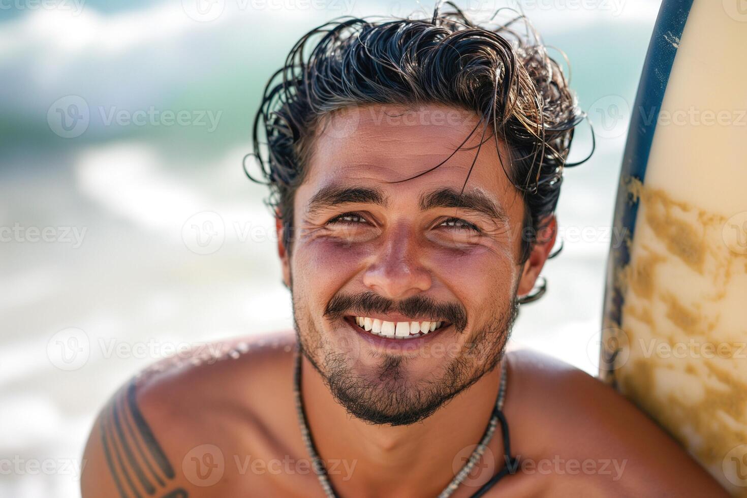 Smiling male surfer with a sun-kissed tan and wavy hair, enjoying a day at the beach with his surfboard. photo