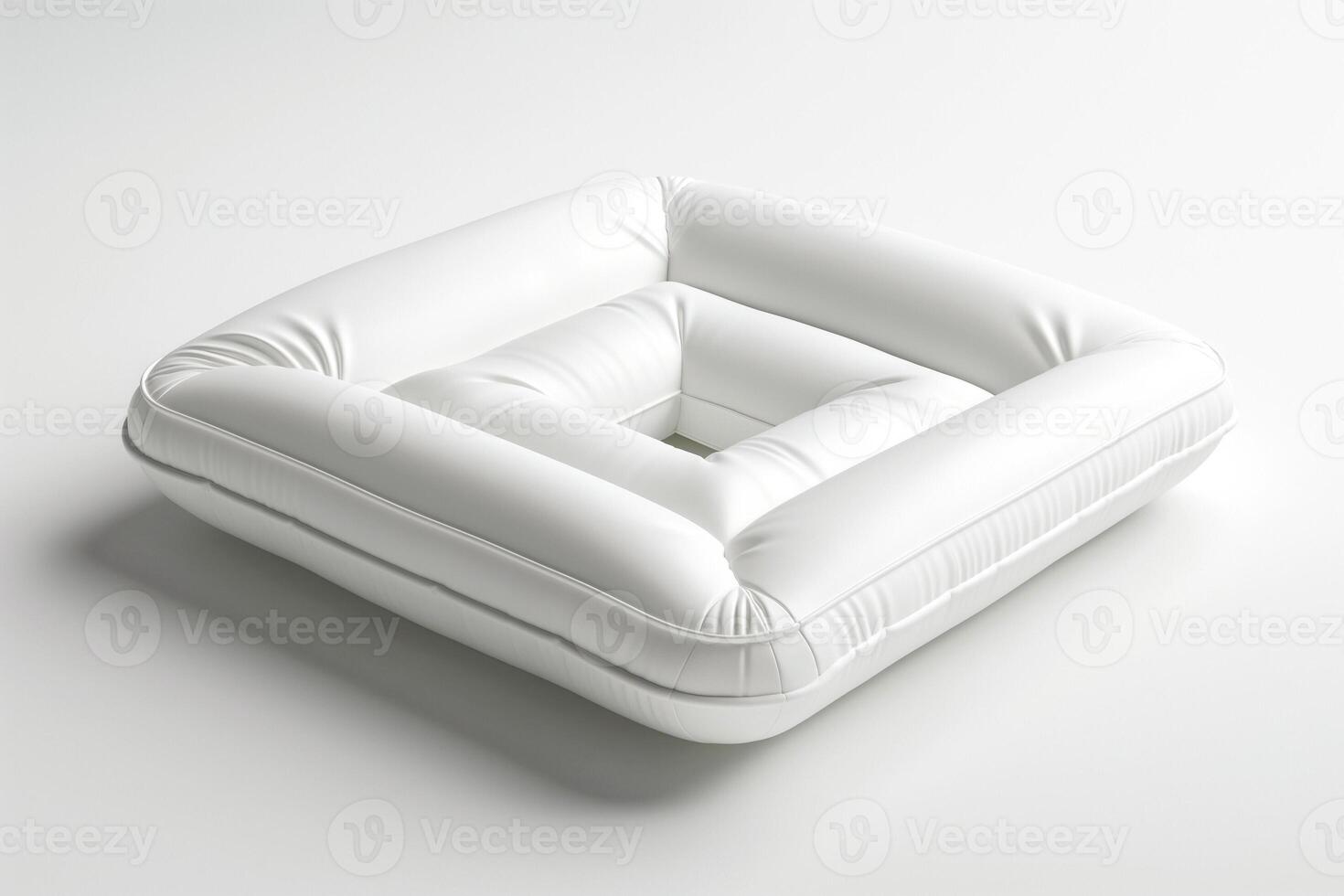 Stylish white square cushion, offering modern comfort and a minimalist aesthetic. photo