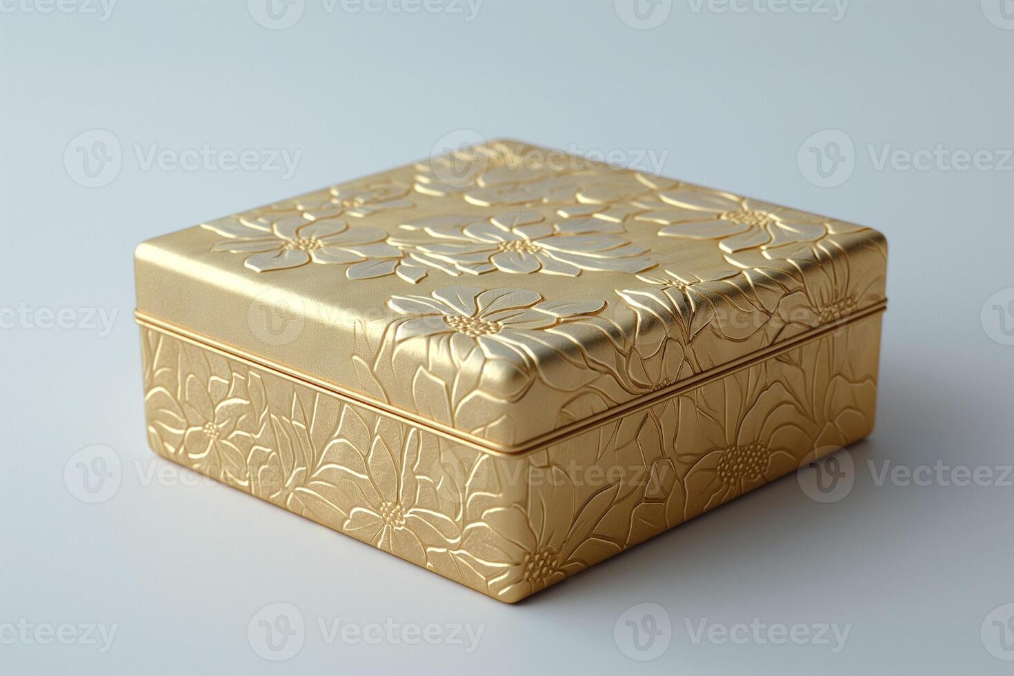 An elegant golden floral embossed gift box, perfect for special occasions and celebrations. photo