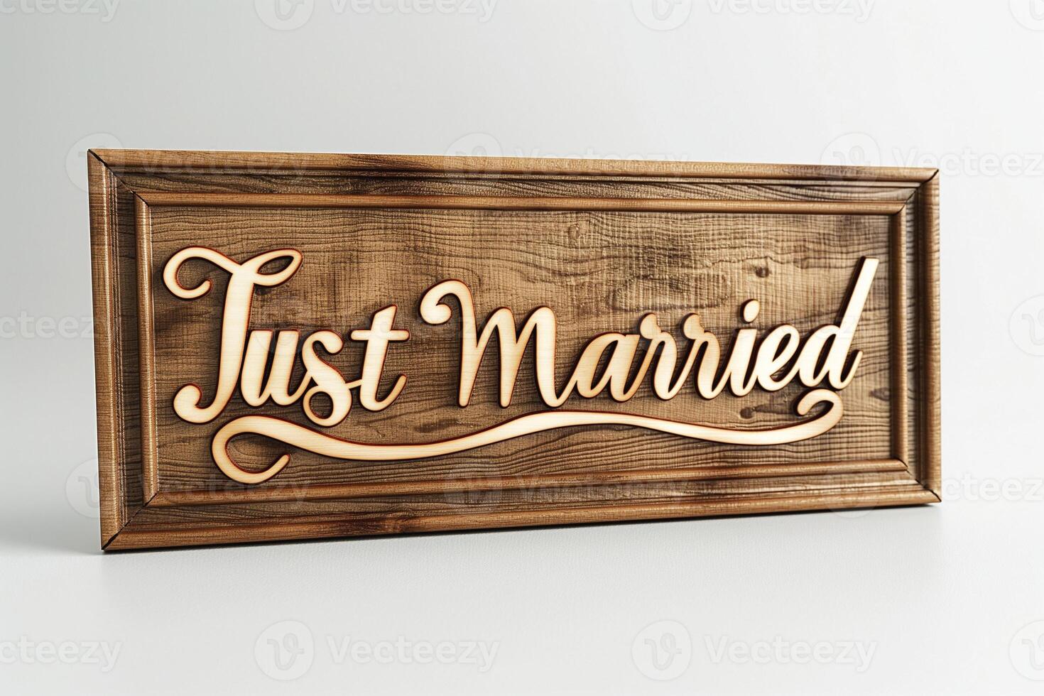 A beautifully crafted wooden sign reading 'Just Married', perfect for celebrating a wedding. photo