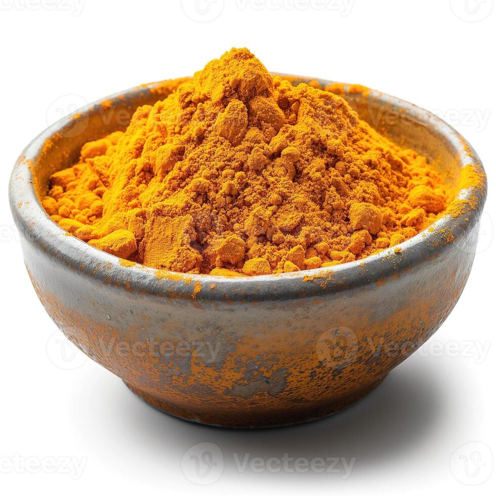 A bowl of vibrant, organic turmeric powder showcasing its bright golden-yellow hue. photo