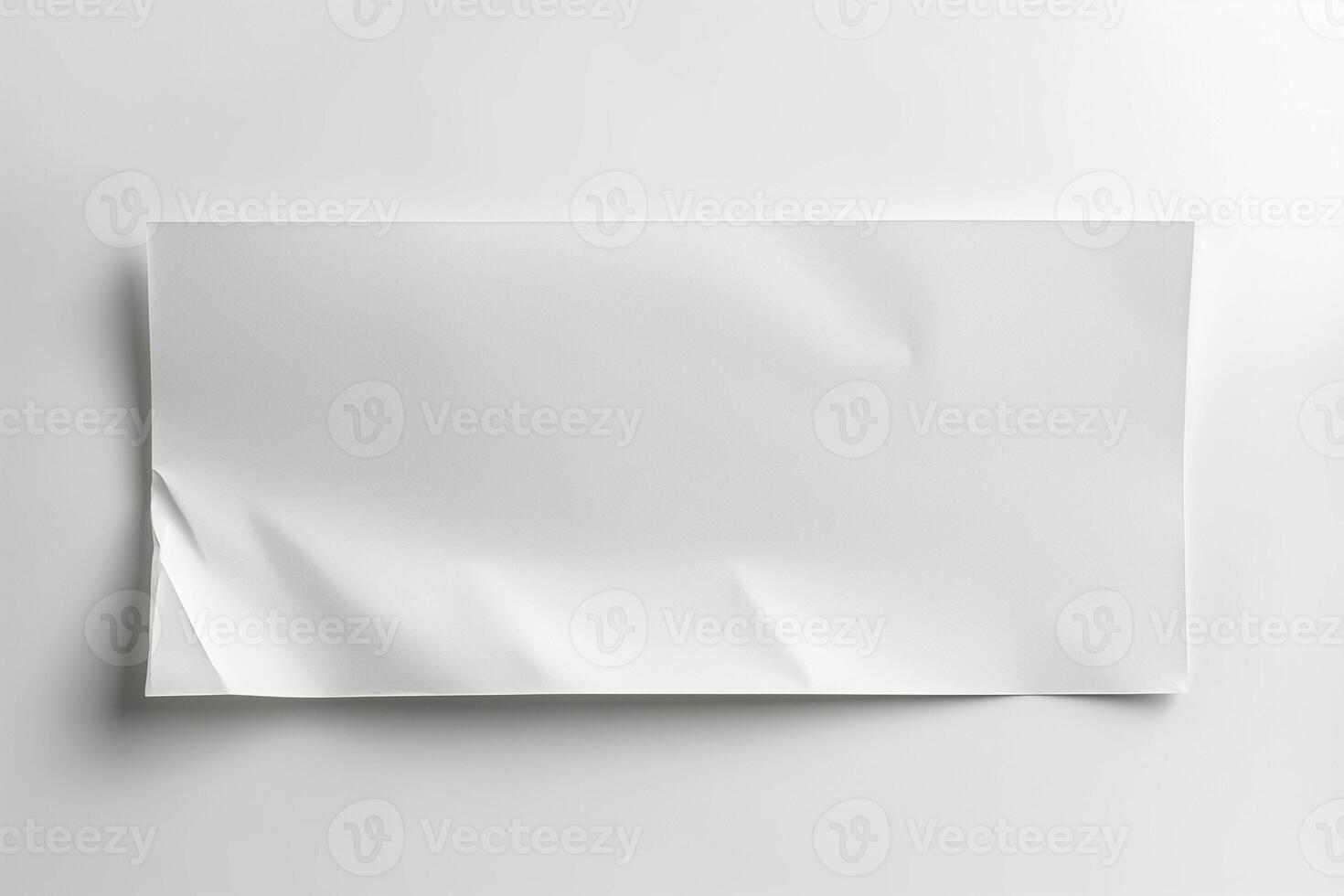 Crumpled white paper on a light background, creating a minimalist and elegant feel. photo