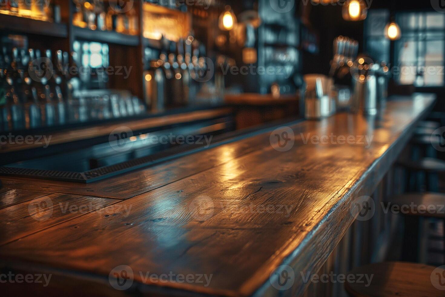 A cozy bar interior with a warm wooden counter and soft lighting, creating an inviting atmosphere for socializing. photo