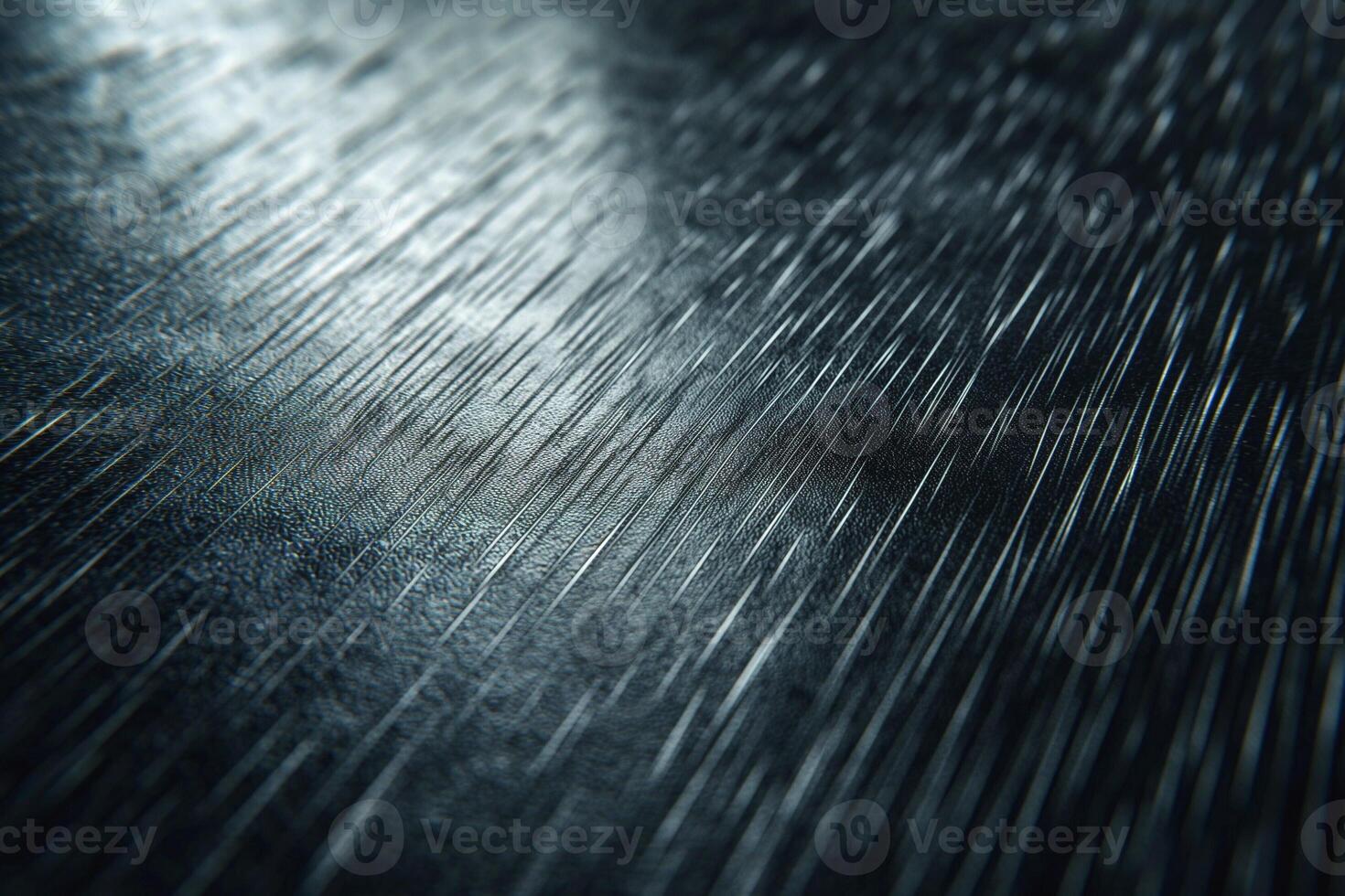 Abstract close-up of a textured metal surface with dramatic light reflections. photo