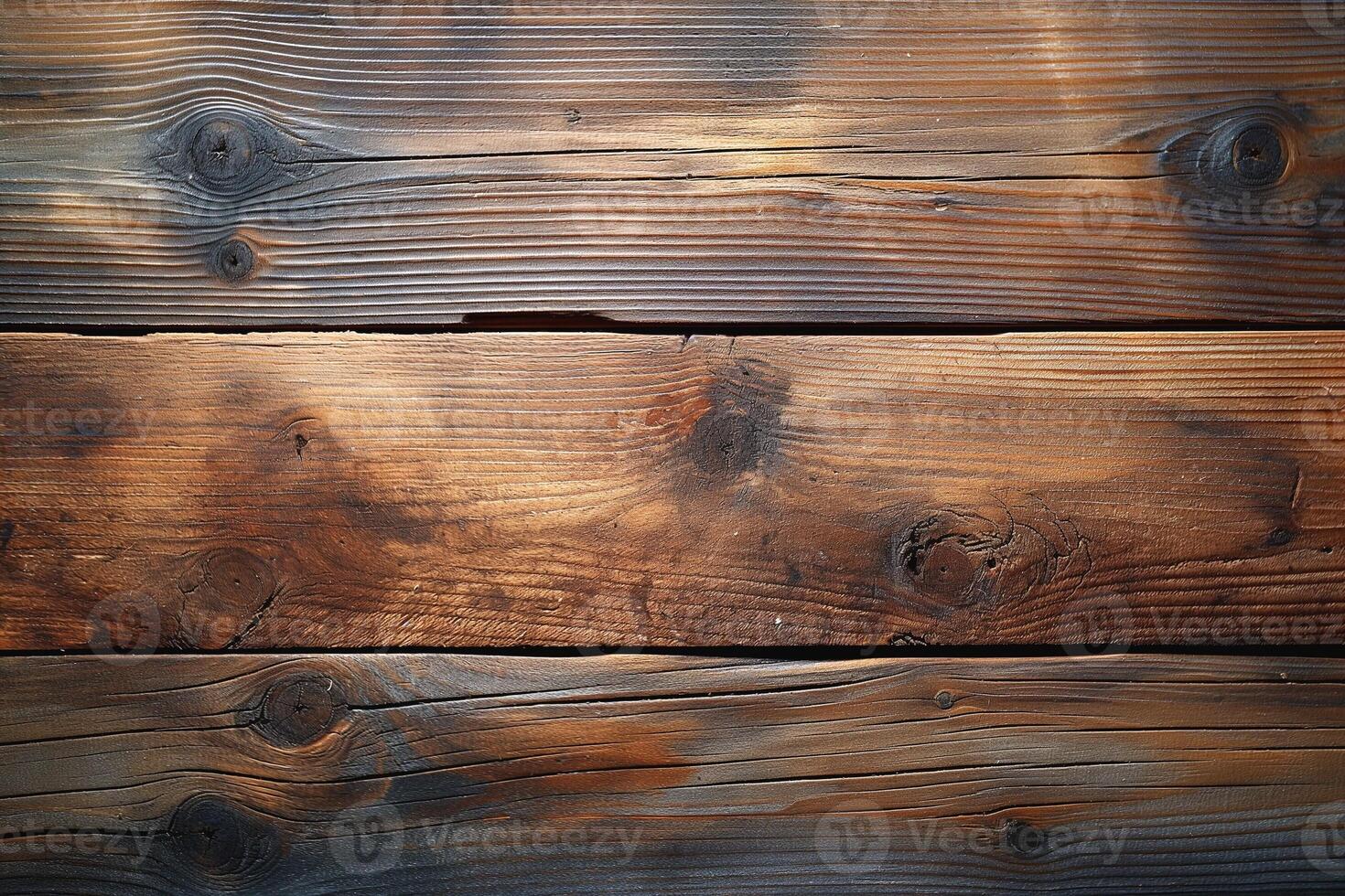 Textured wooden planks with a rustic finish, showcasing rich brown tones and natural grain patterns. photo