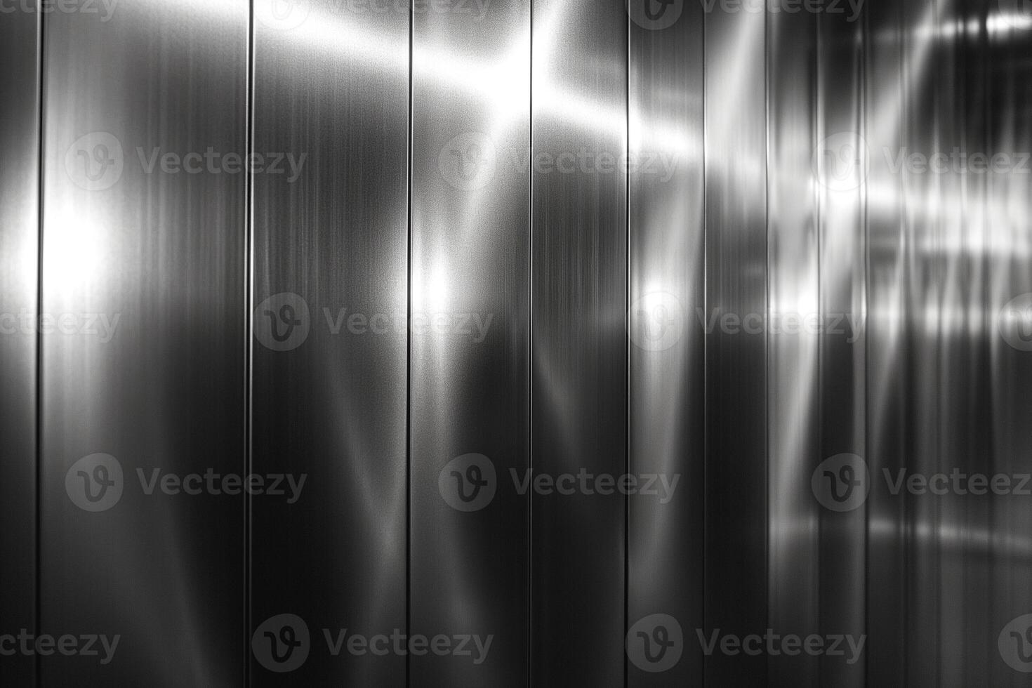 A sleek, reflective metallic surface with intricate light patterns, creating a modern and industrial aesthetic. photo