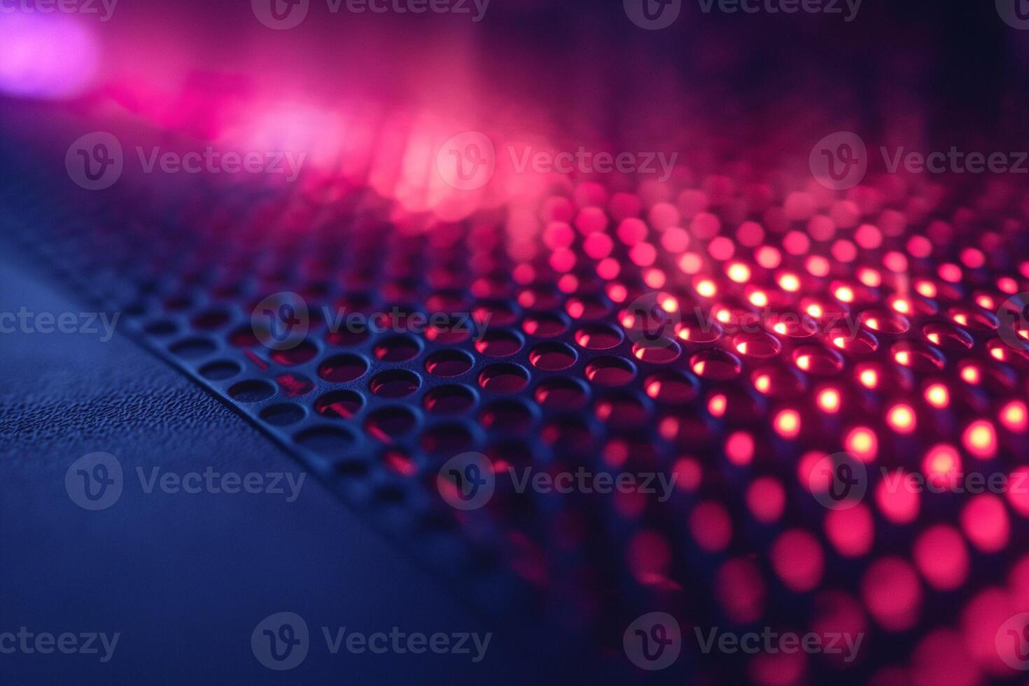 Close-up of a textured surface with vibrant purple and pink lighting effects, creating a futuristic and dynamic atmosphere. photo